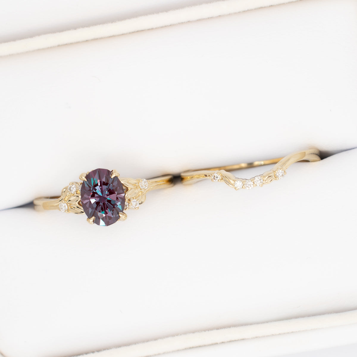 kinsley nature inspired wedding set in yellow gold with oval lab alexandrite