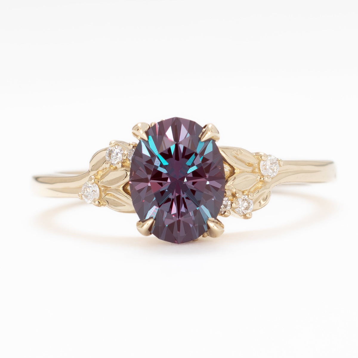 kinsley nature inspired wedding set in yellow gold with oval lab alexandrite