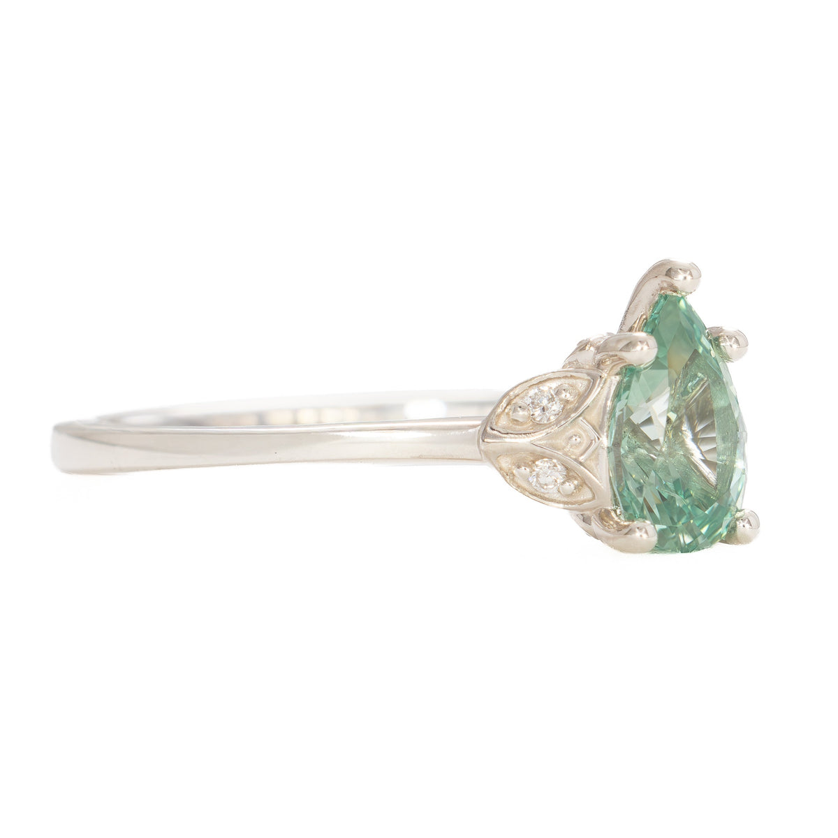 krystal accented engagement ring in silver with eden pear sage green lab sapphire