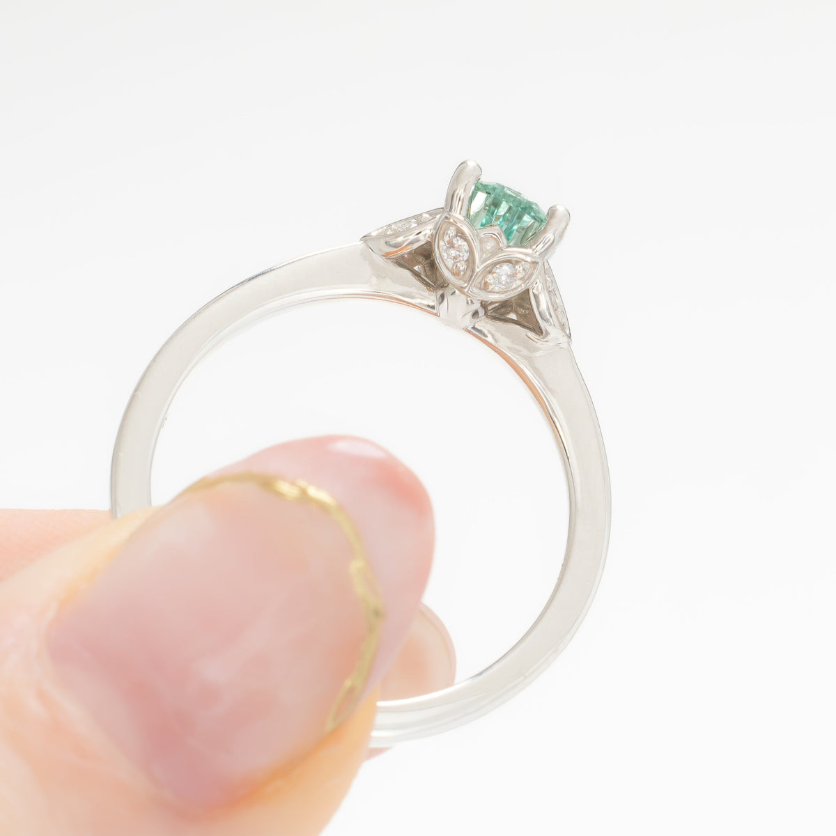 krystal accented engagement ring in silver with eden pear sage green lab sapphire