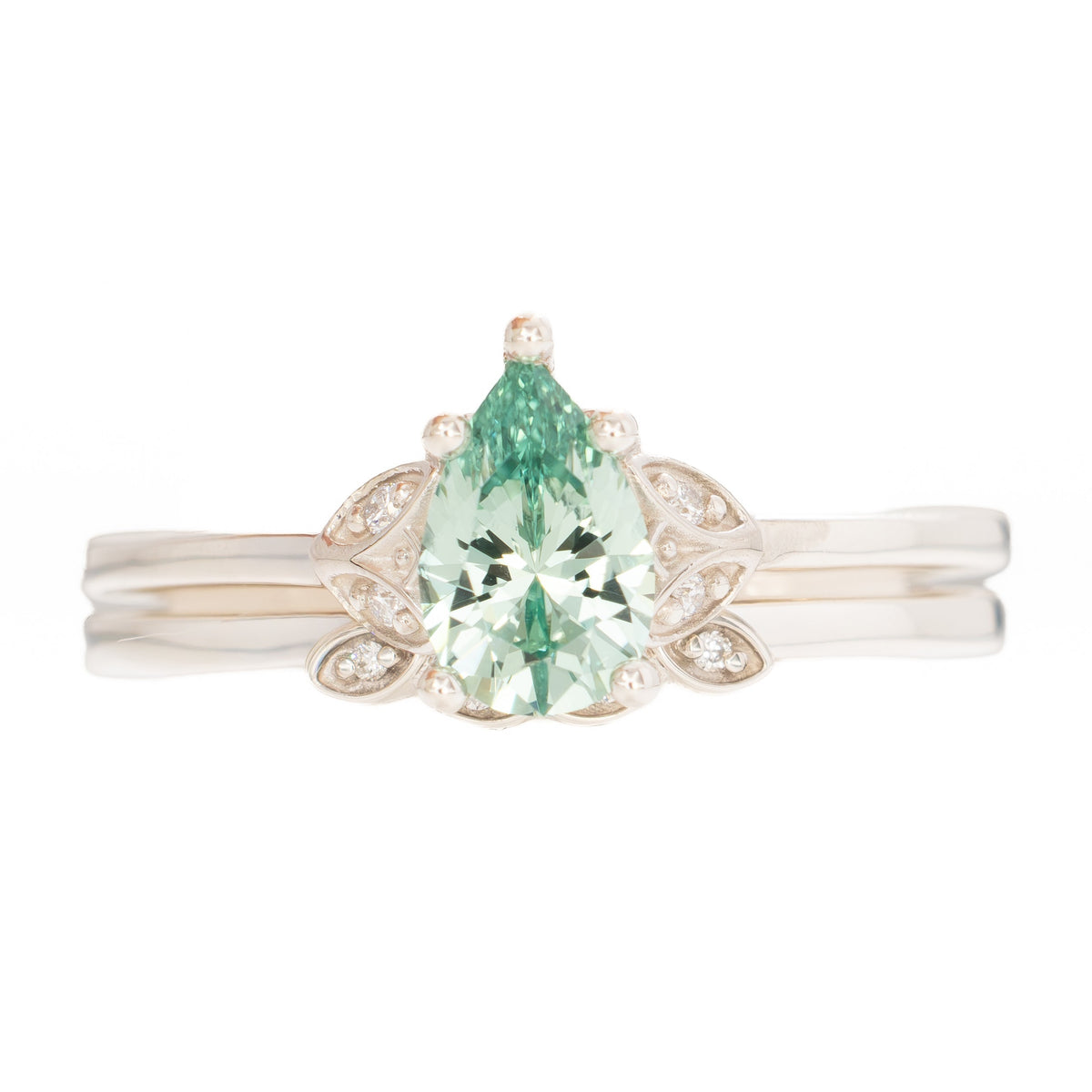 krystal accented engagement ring in silver with eden pear sage green lab sapphire