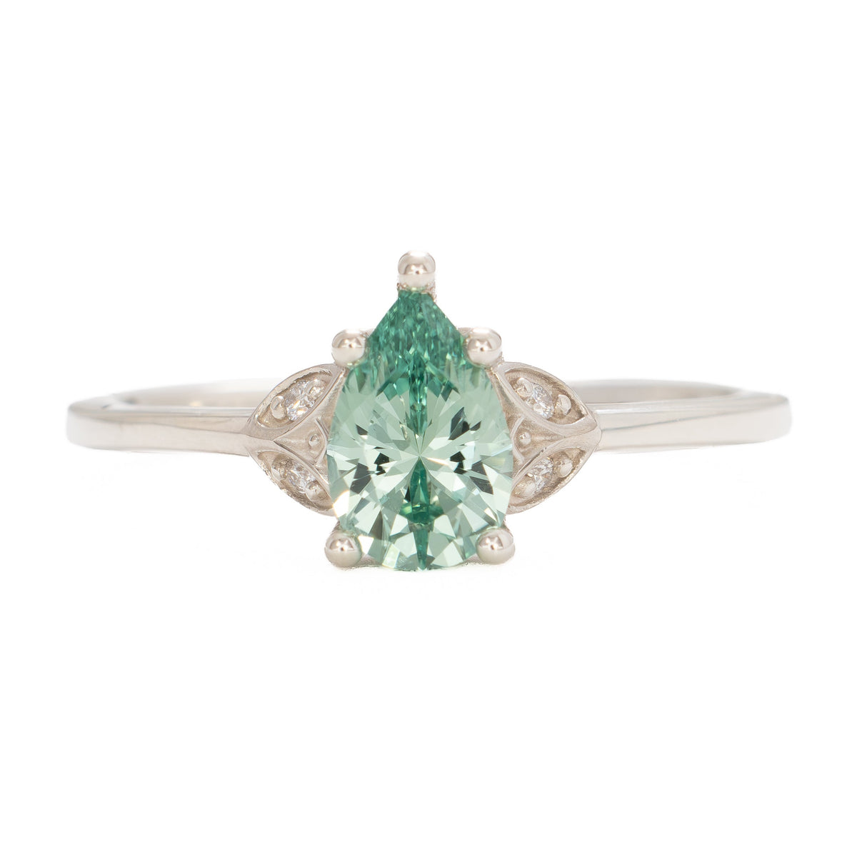 krystal accented engagement ring in silver with eden pear sage green lab sapphire