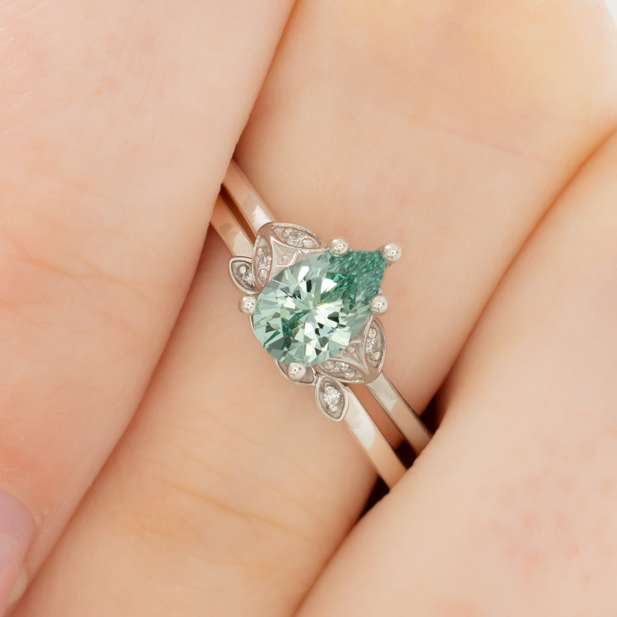 krystal accented engagement ring in silver with eden pear sage green lab sapphire