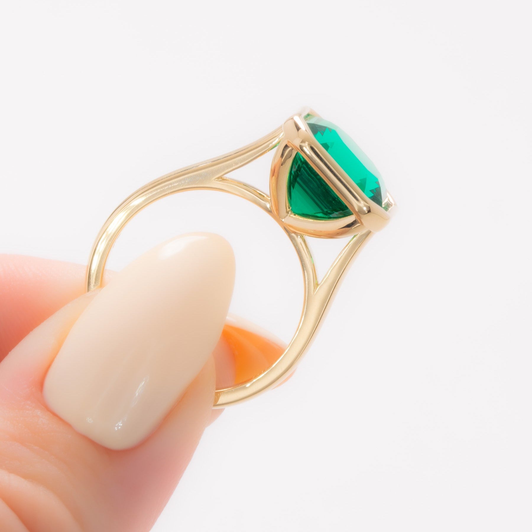 lessie bezel set solitaire with lab emerald asscher