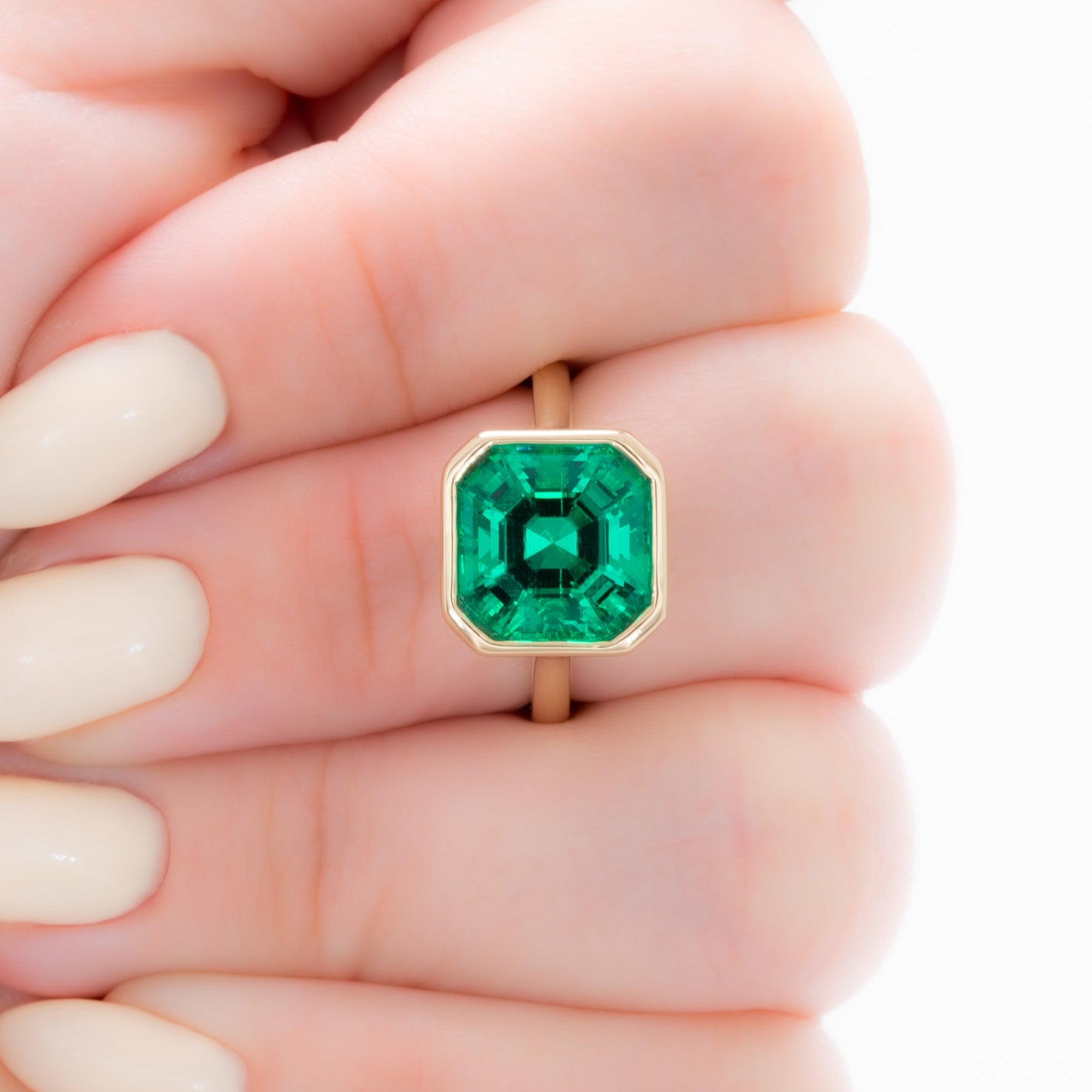 lessie bezel set solitaire with lab emerald asscher