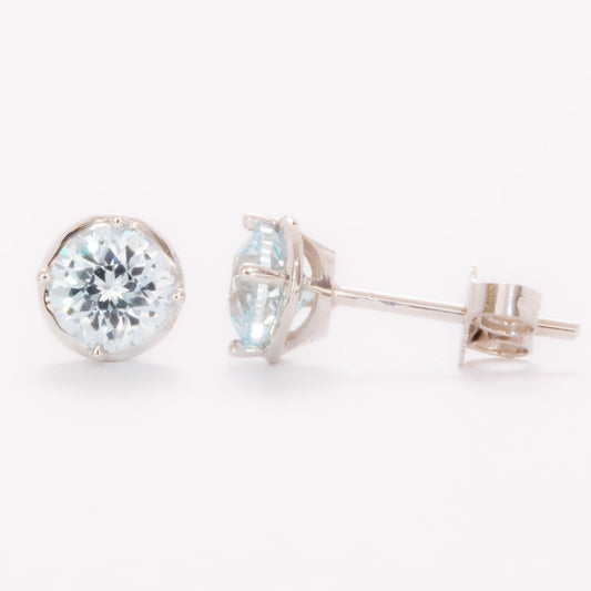 light blue round lab sapphire earrings in white gold