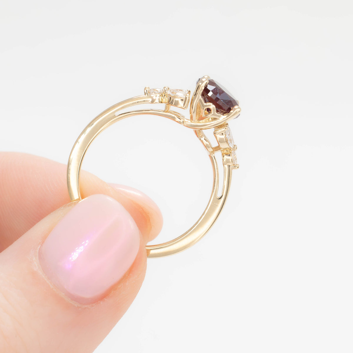 lili nature inspired engagement ring in yellow gold with pear lab alexandrite