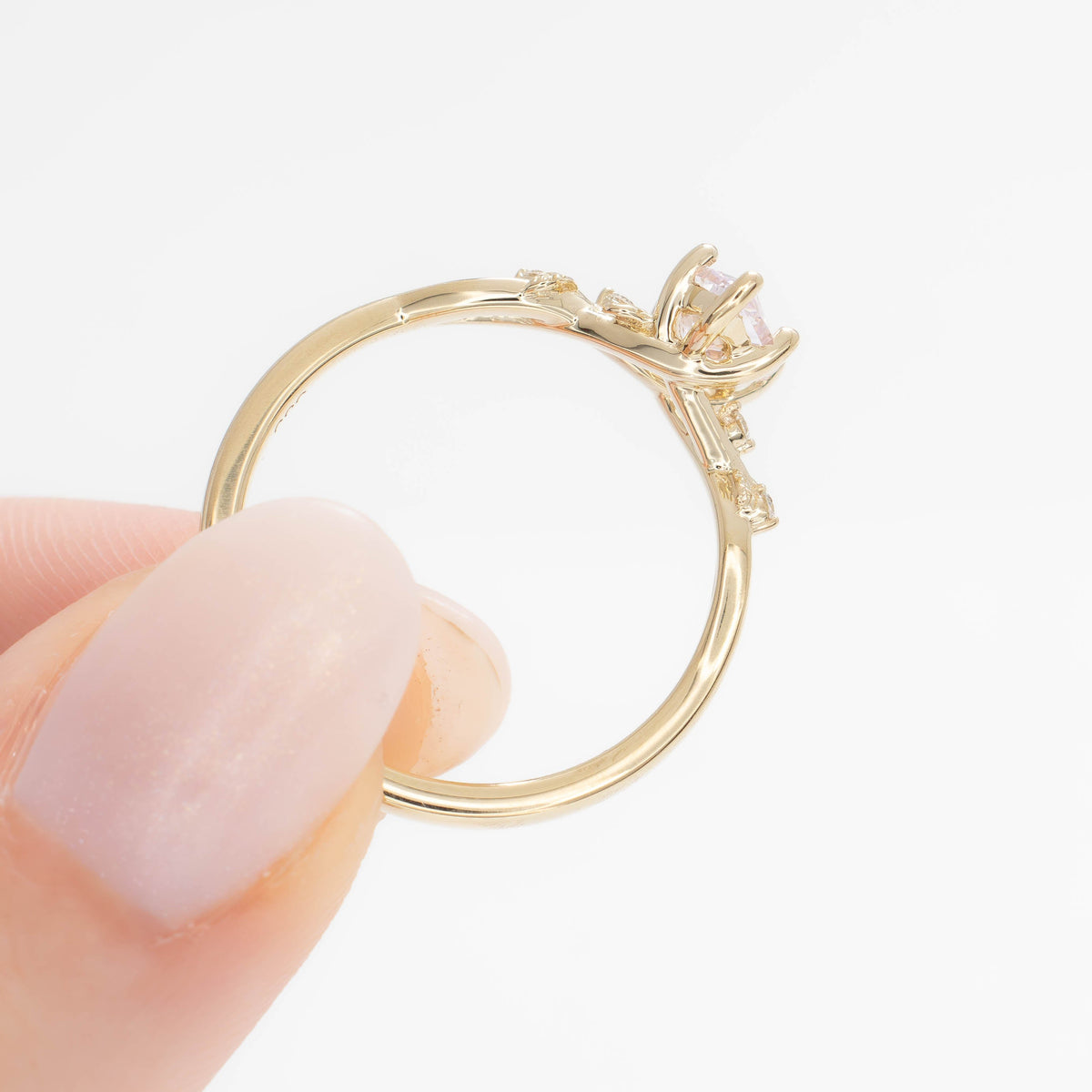 A beautiful garden to be worn everyday, Lillian's delicate vines and leaves will hold your perfect gem as well as your heart.