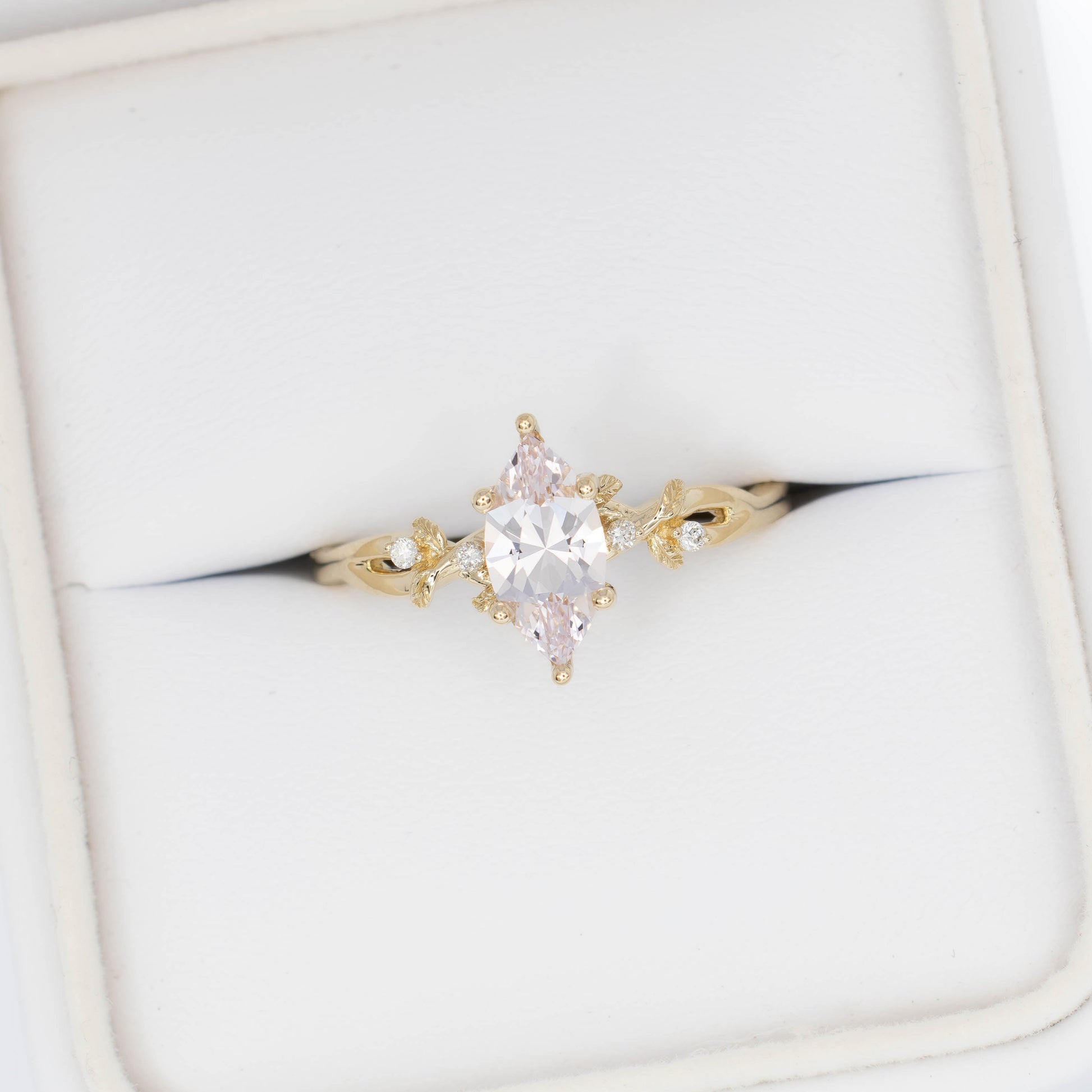 A beautiful garden to be worn everyday, Lillian's delicate vines and leaves will hold your perfect gem as well as your heart.