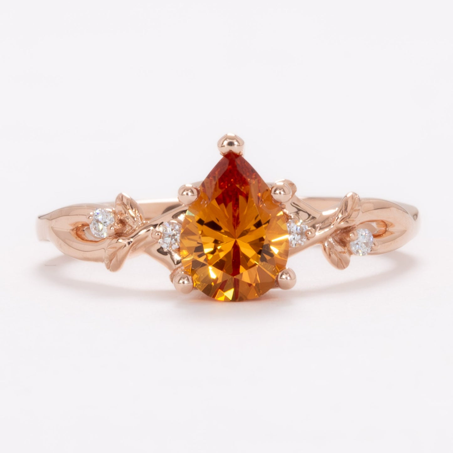 lillian nature inspired ring with pear orange lab sapphire