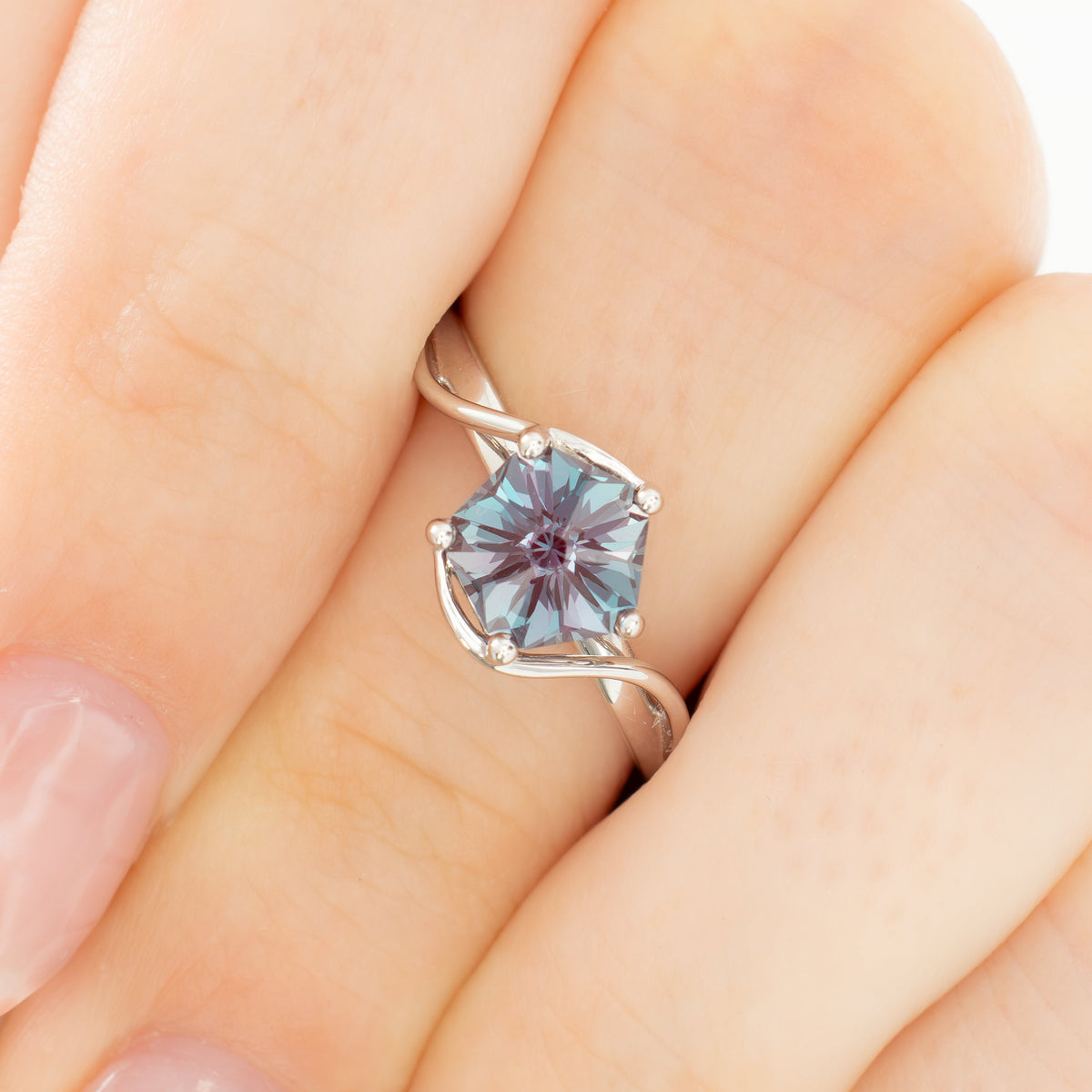 liyana bypass solitaire in white gold with hanami flower lab alexandrite