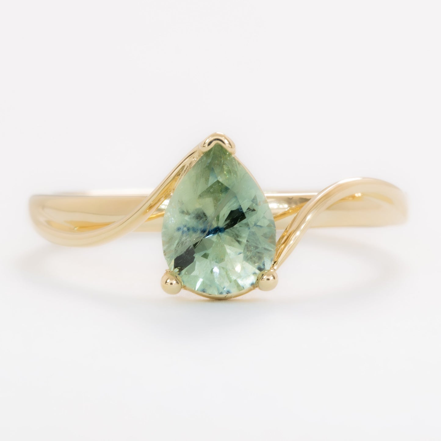 liyana solitaire bypass engagement ring with pear montana sapphire