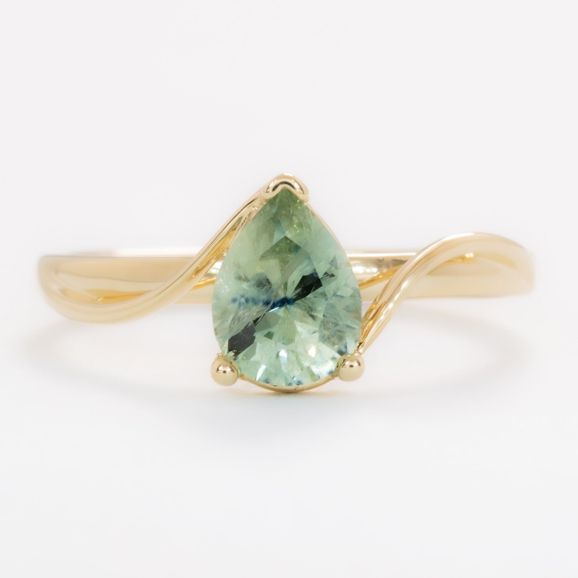 liyana solitaire bypass engagement ring with pear montana sapphire