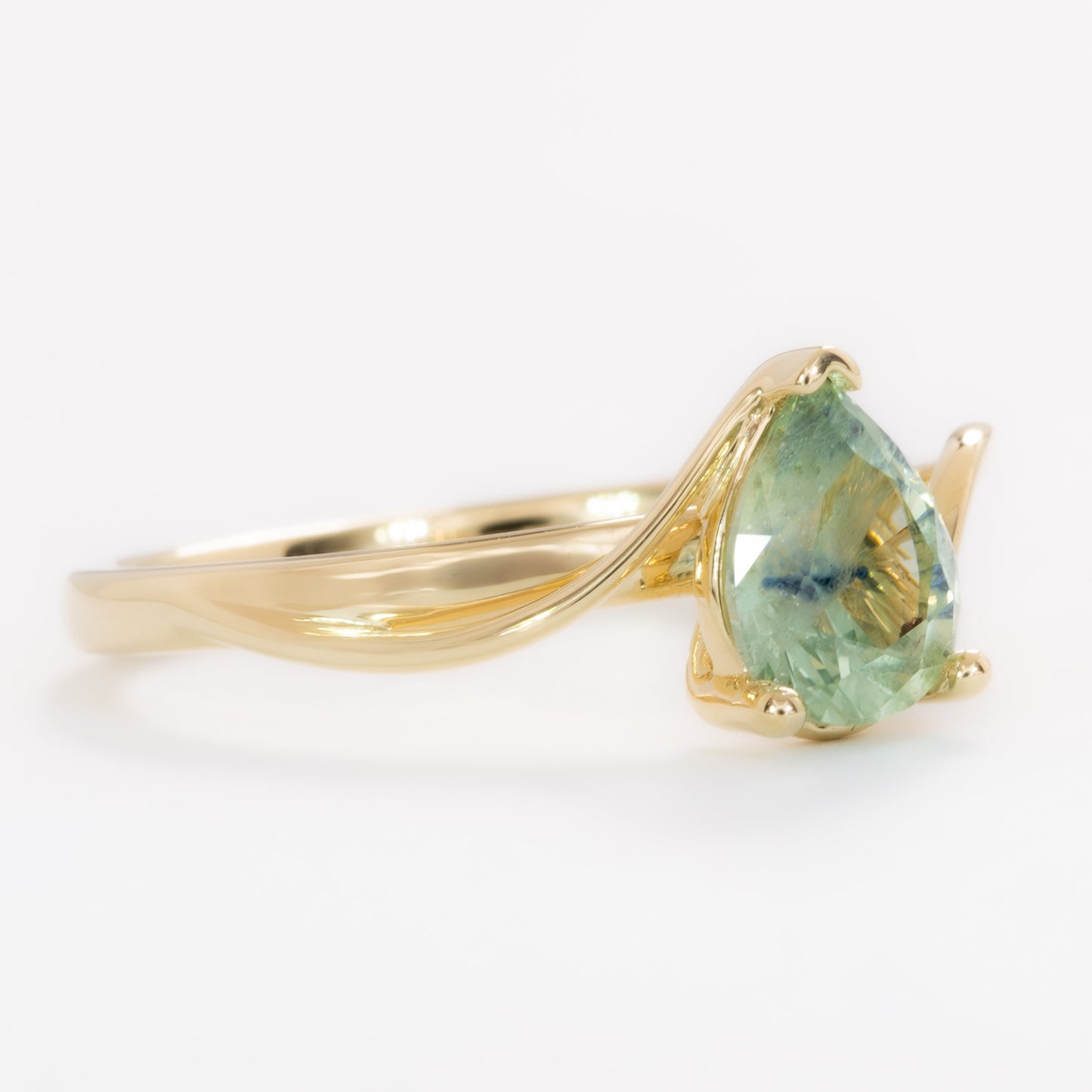 liyana solitaire bypass engagement ring with pear montana sapphire