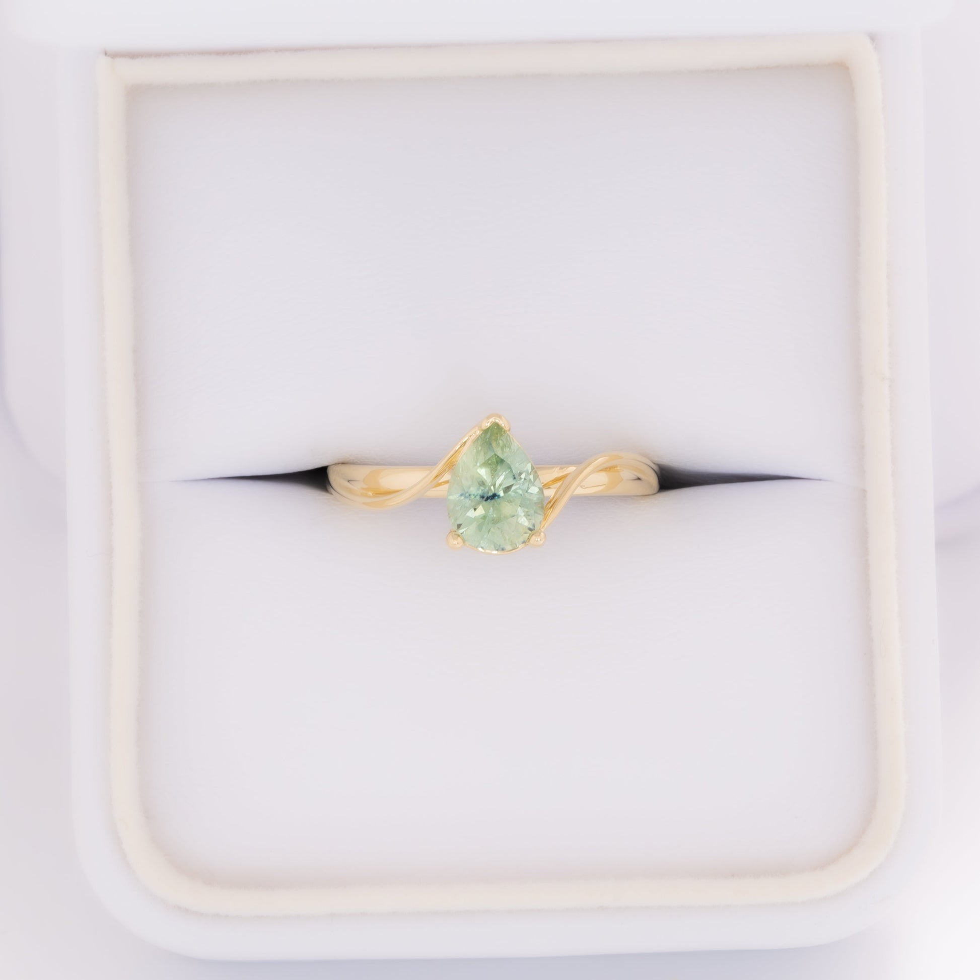 liyana solitaire bypass engagement ring with pear montana sapphire