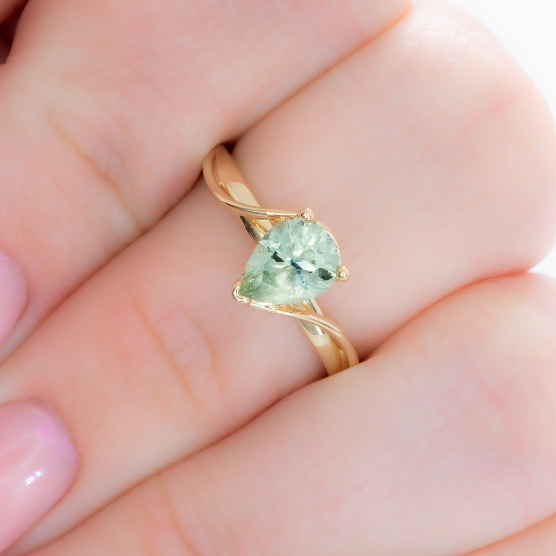 liyana solitaire bypass engagement ring with pear montana sapphire