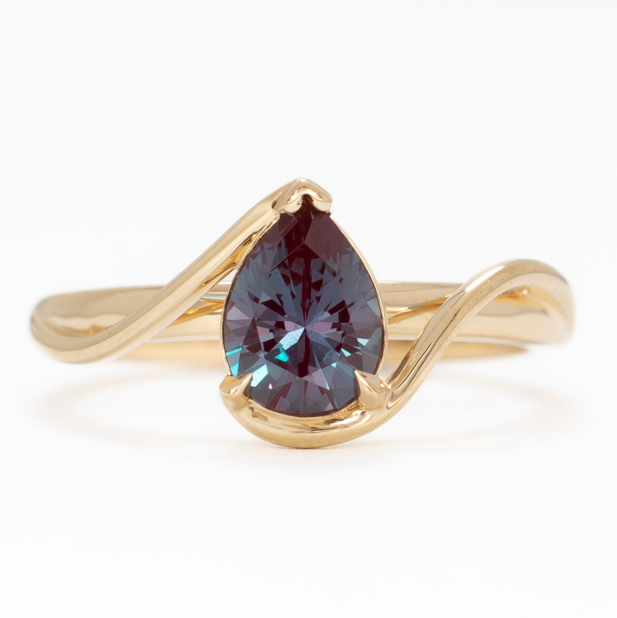 liyana solitaire bypass ring in yellow gold with pear lab alexandrite