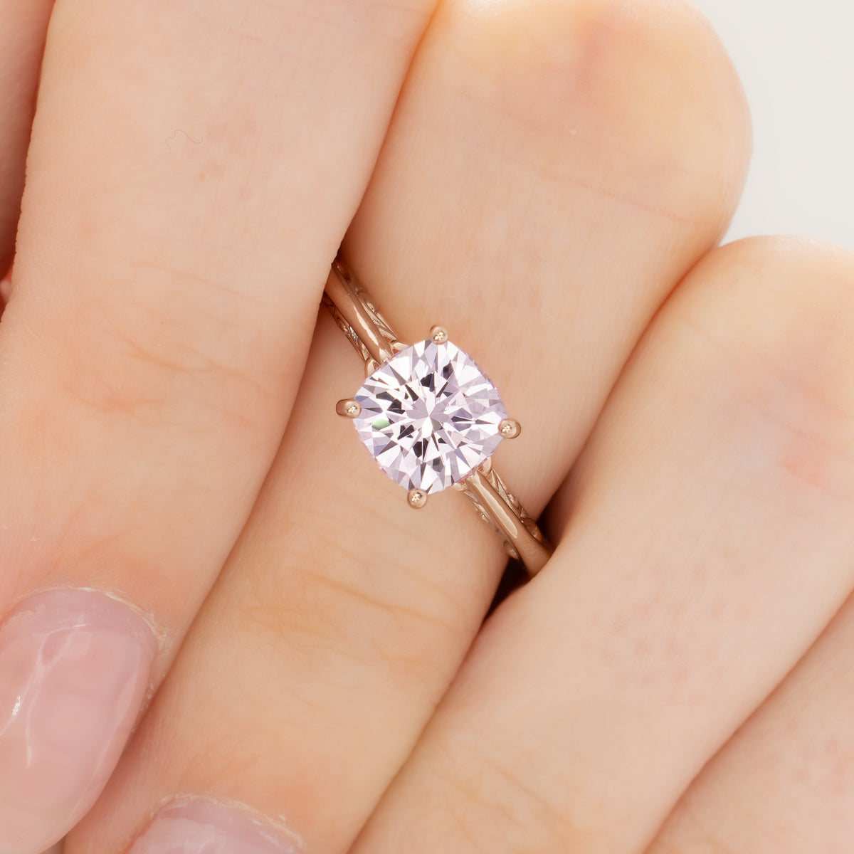 lyric solitaire ring in rose gold with blush pink lab sapphire nova cushion