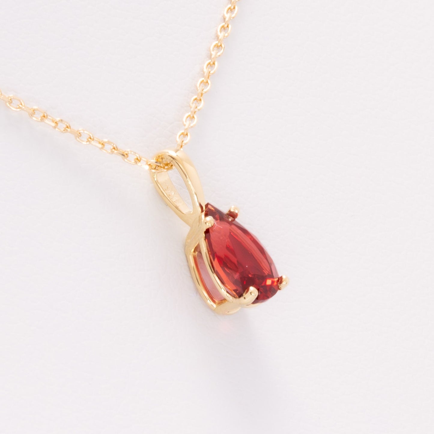 marley necklace in yellow gold with pear cut lab ruby