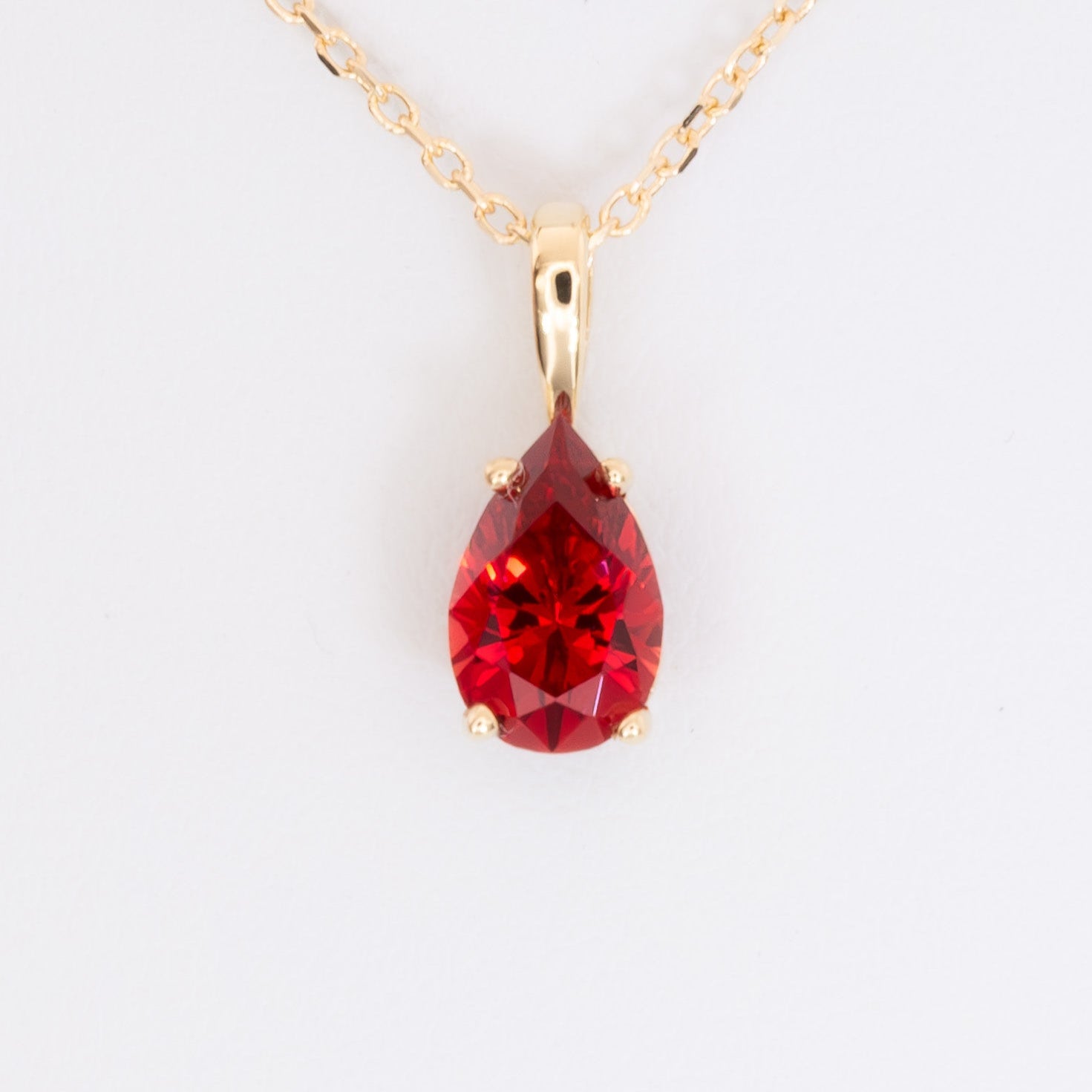 marley necklace in yellow gold with pear cut lab ruby