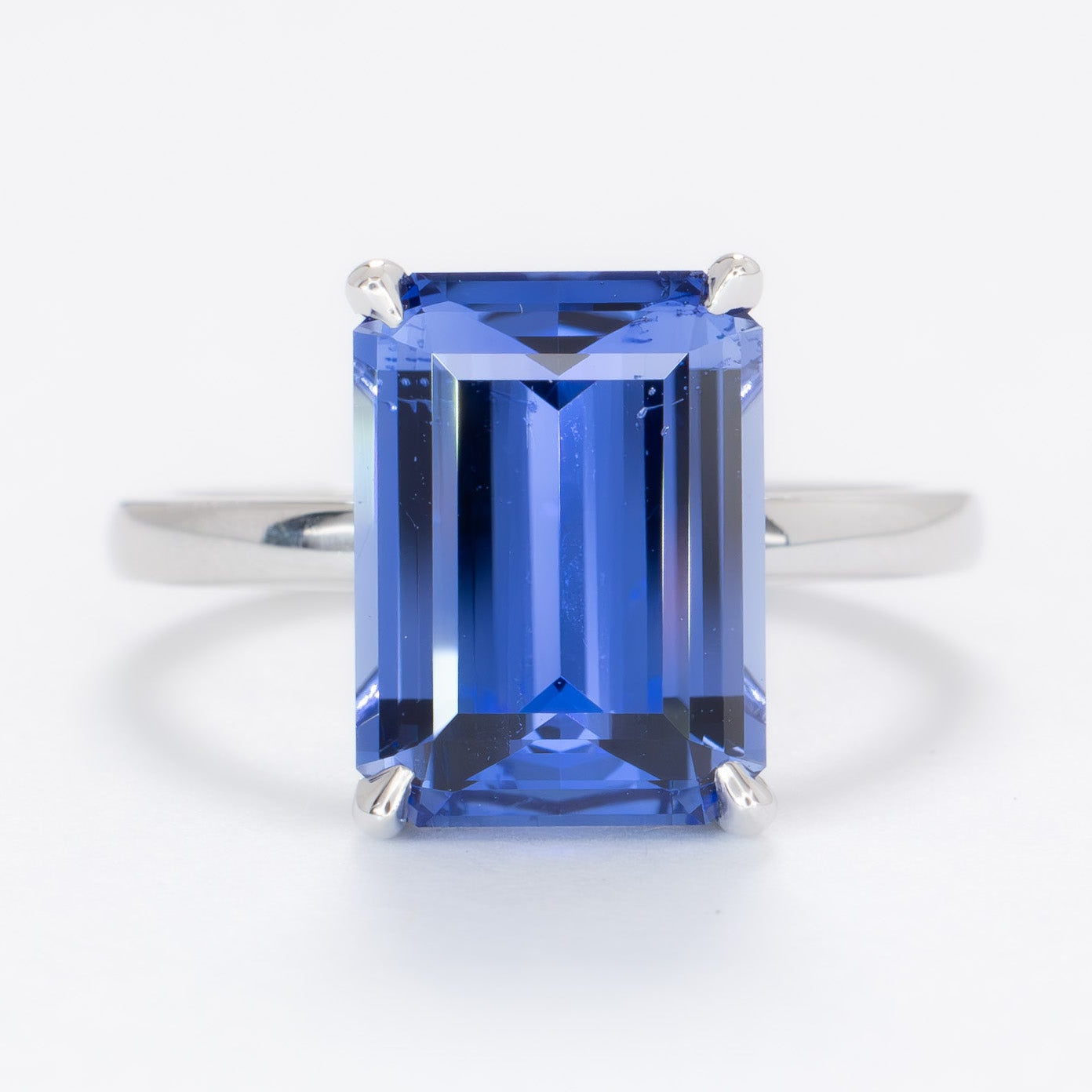 medium blue lab sapphire solitaire engagement ring