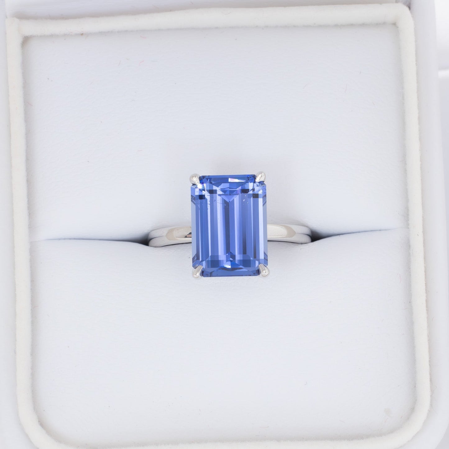 medium blue lab sapphire solitaire engagement ring