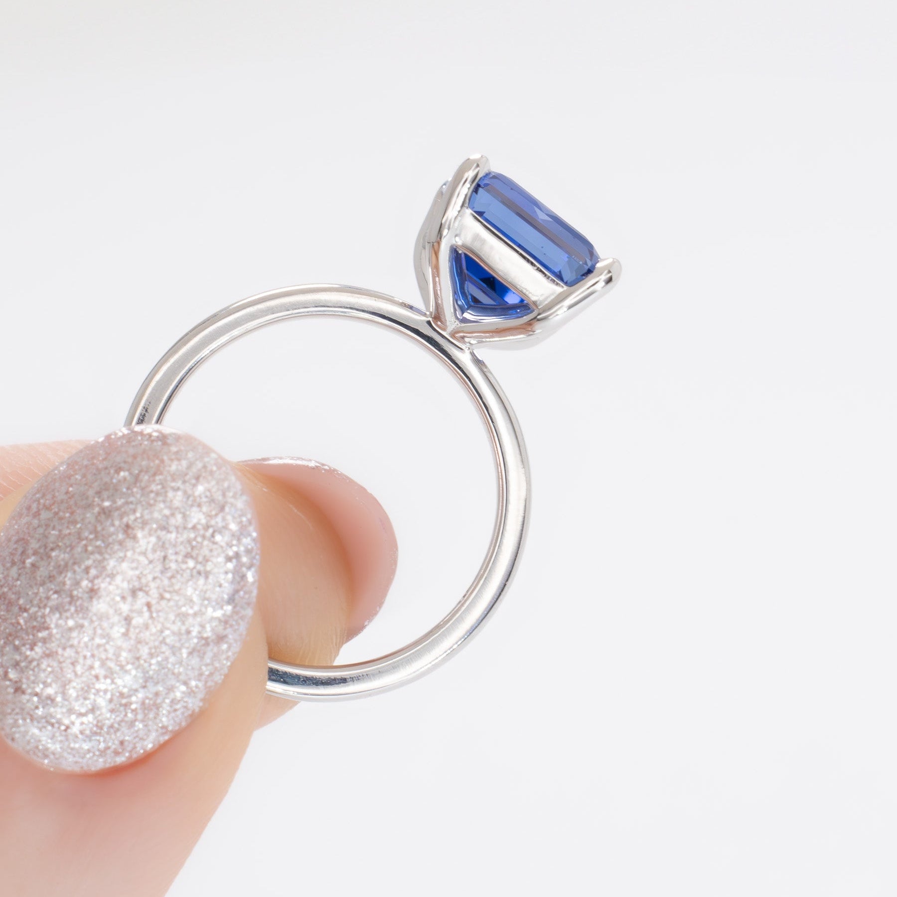 medium blue lab sapphire solitaire engagement ring