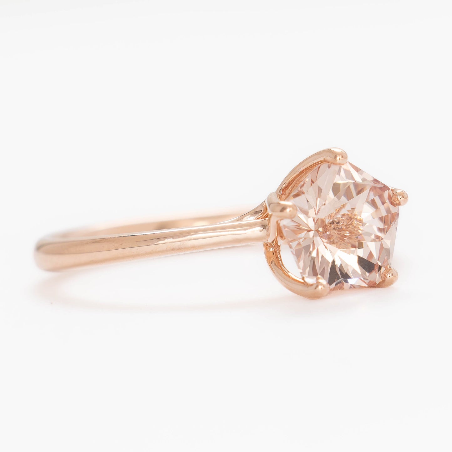 misha solitaire in rose gold with petal basket and pink lab sapphire flower