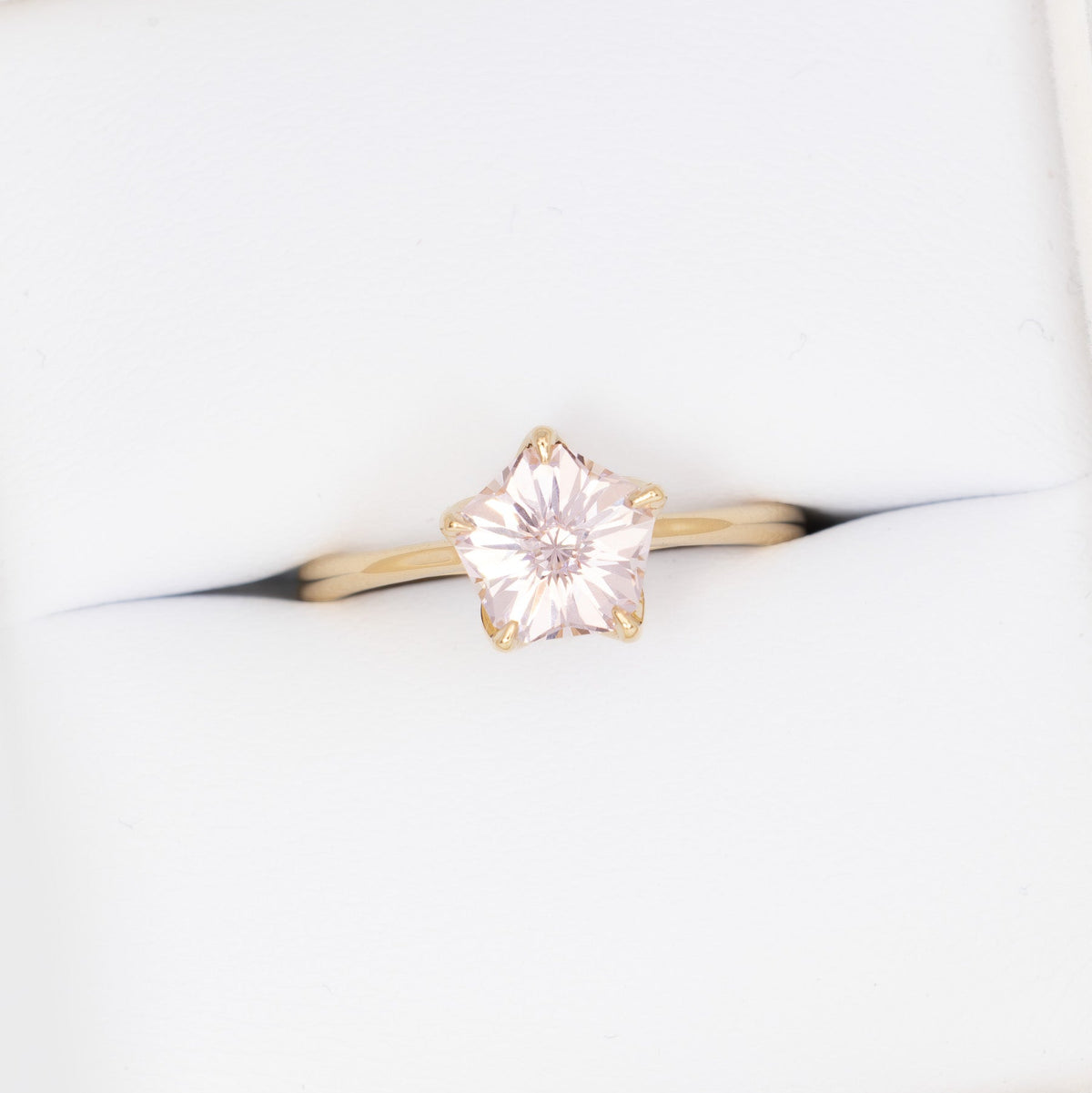 misha solitaire ring in yellow gold with pink hanami flower lab sapphire