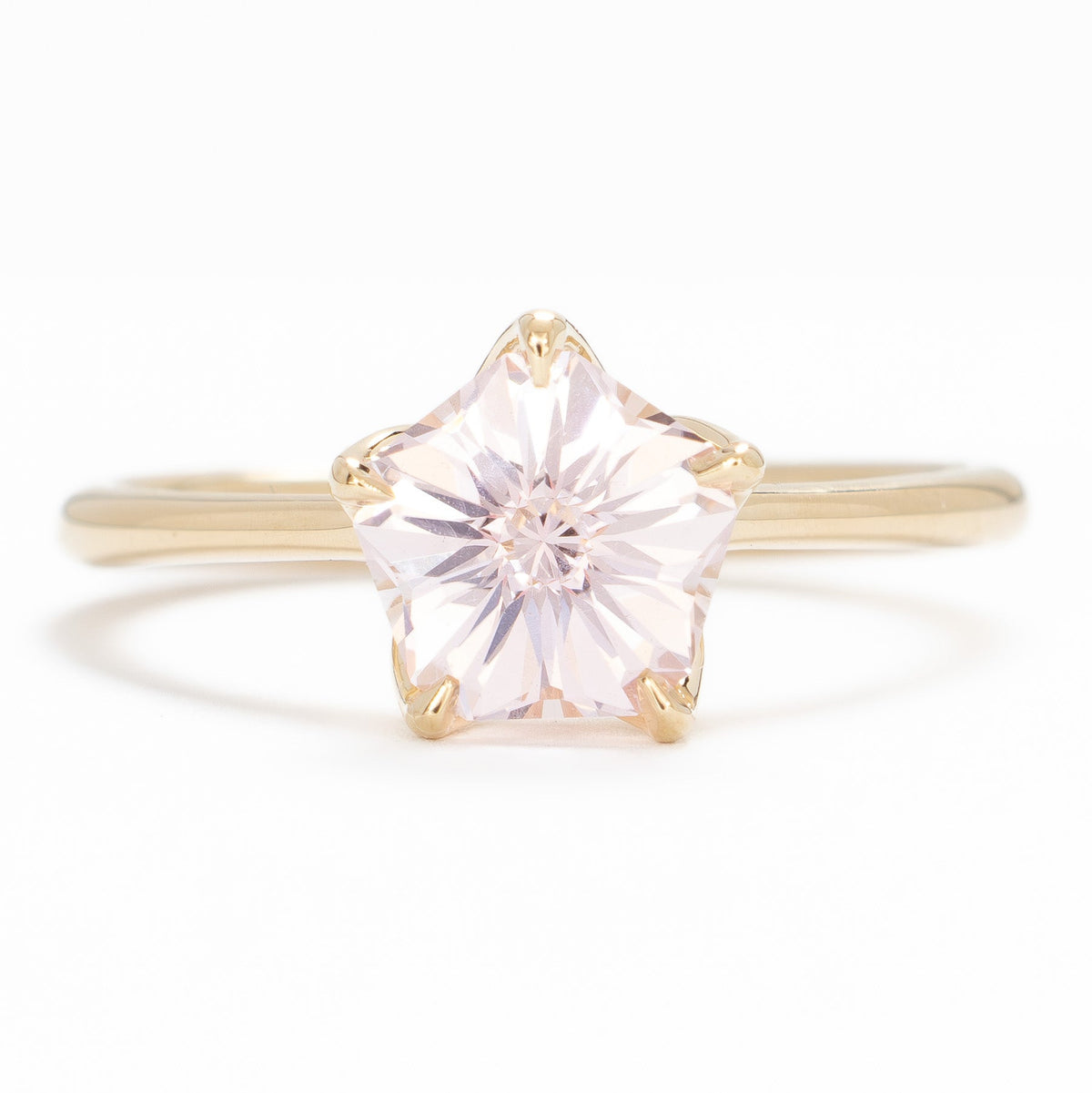 misha solitaire ring in yellow gold with pink hanami flower lab sapphire