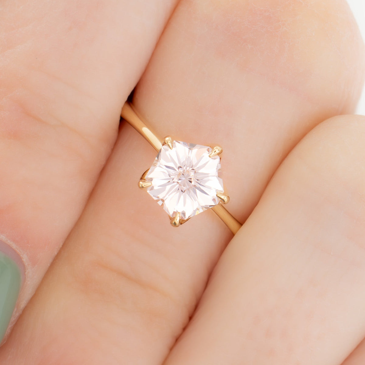 misha solitaire ring in yellow gold with pink hanami flower lab sapphire