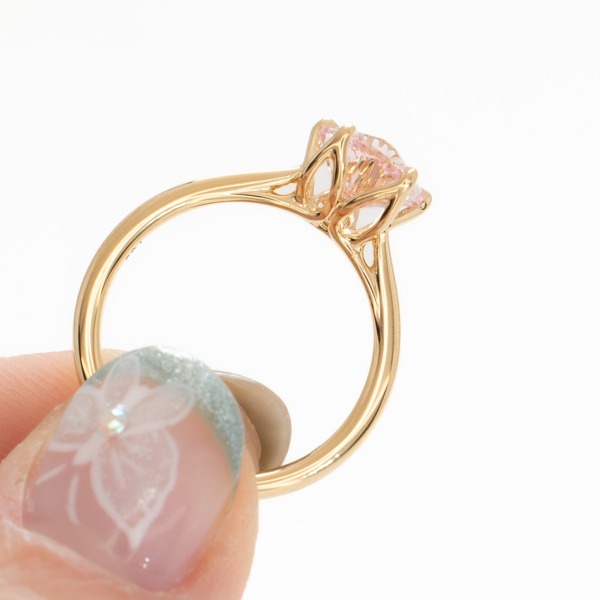 misha solitaire ring in yellow gold with pink hanami flower lab sapphire