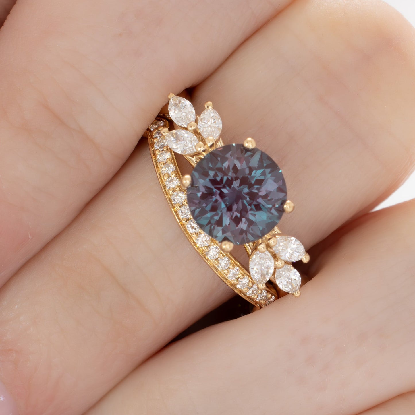 modified fifer wedding set in yellow gold with a round lab alexandrite 