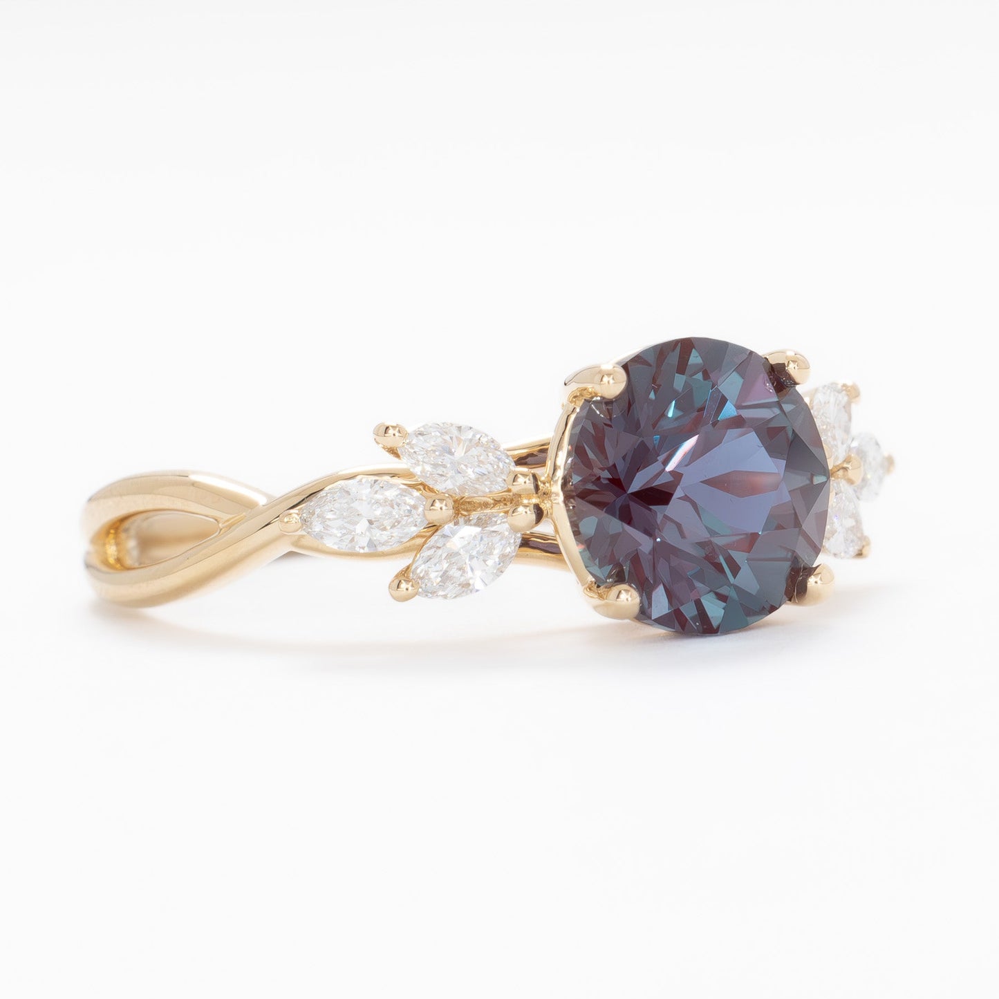modified fifer wedding set in yellow gold with a round lab alexandrite 