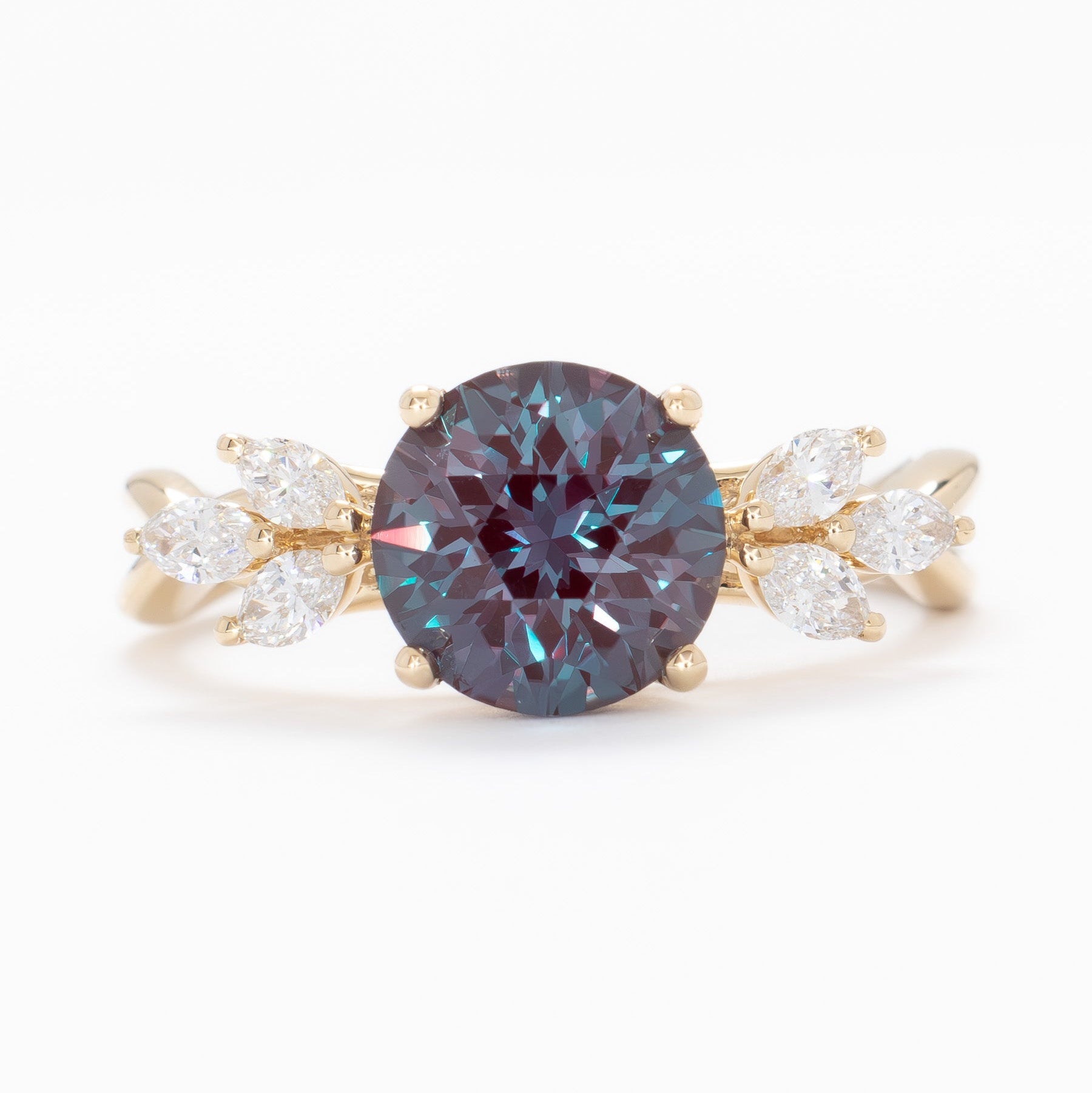 modified fifer wedding set in yellow gold with a round lab alexandrite 