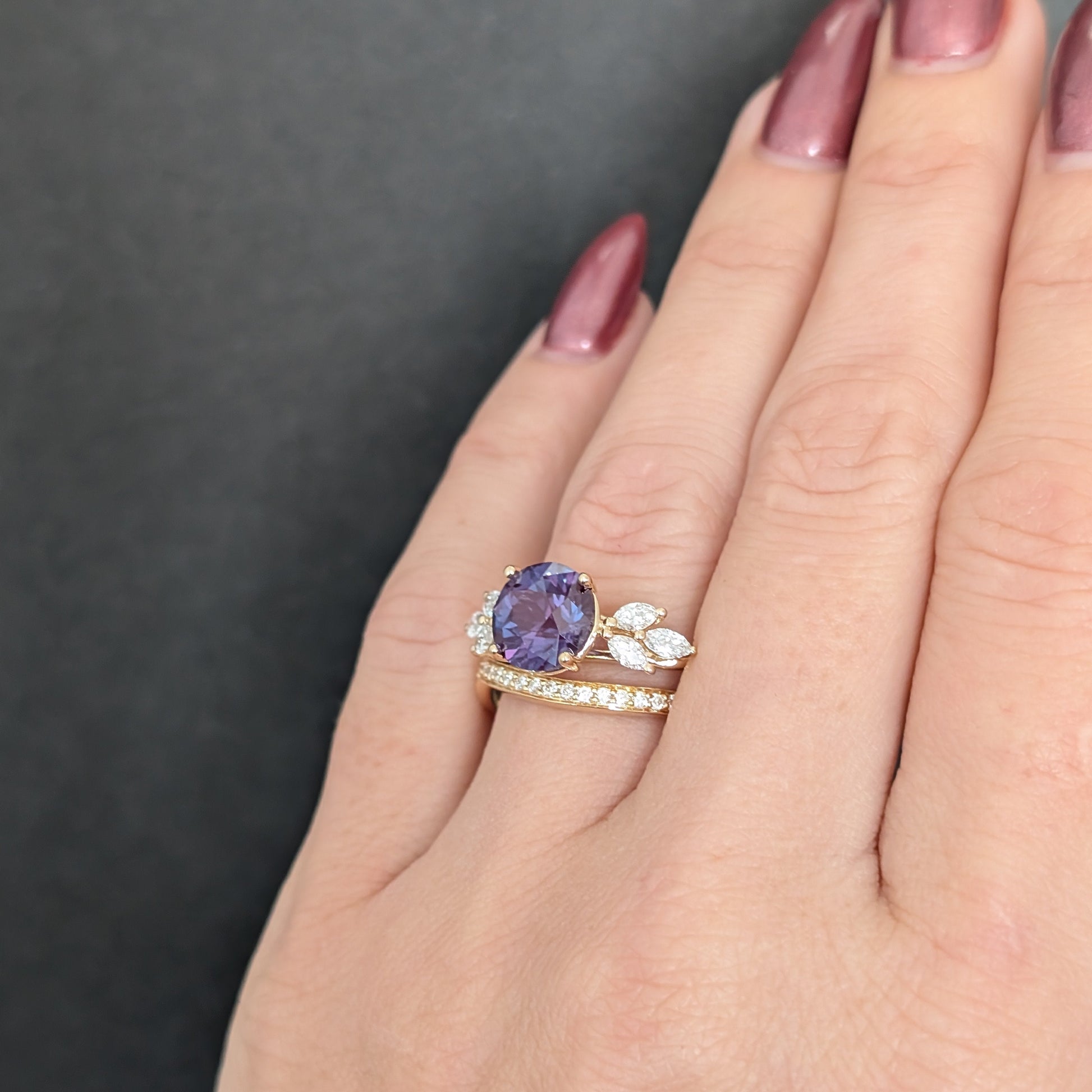 modified fifer wedding set in yellow gold with a round lab alexandrite 