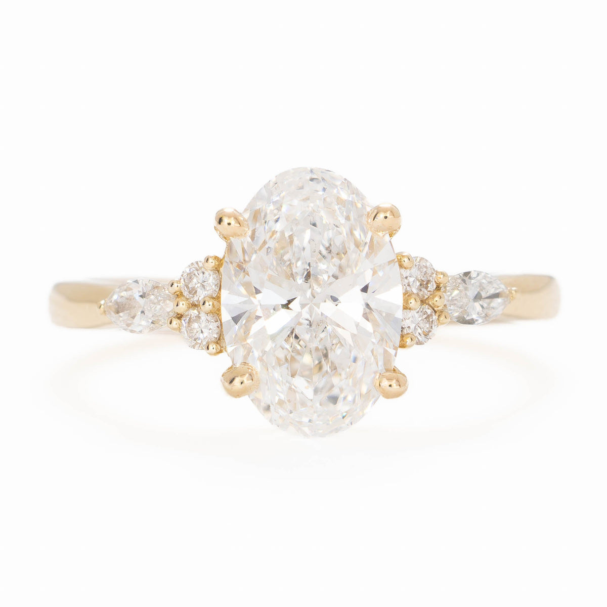 modified natalia ring in yellow gold with lab diamond oval