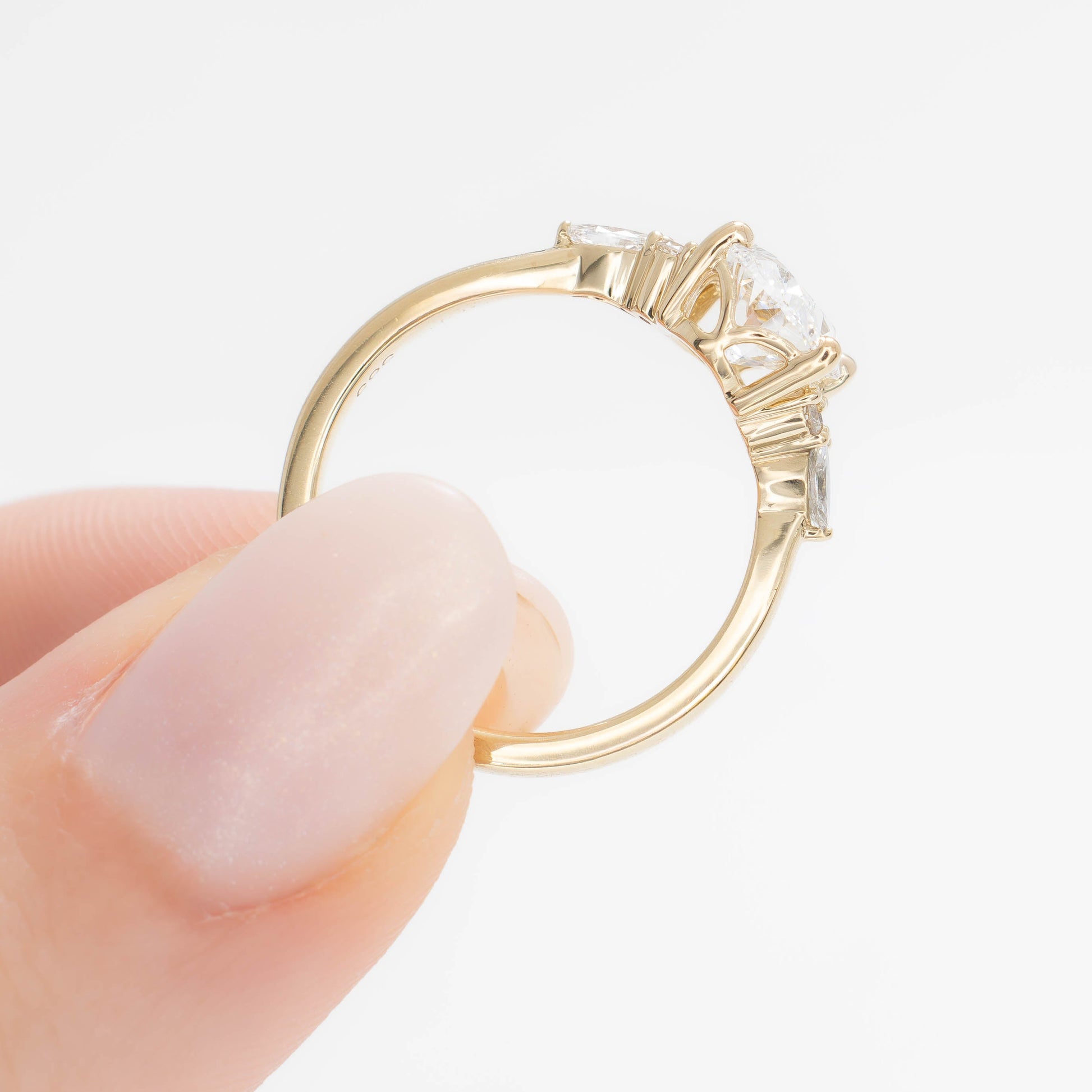 modified natalia ring in yellow gold with lab diamond oval