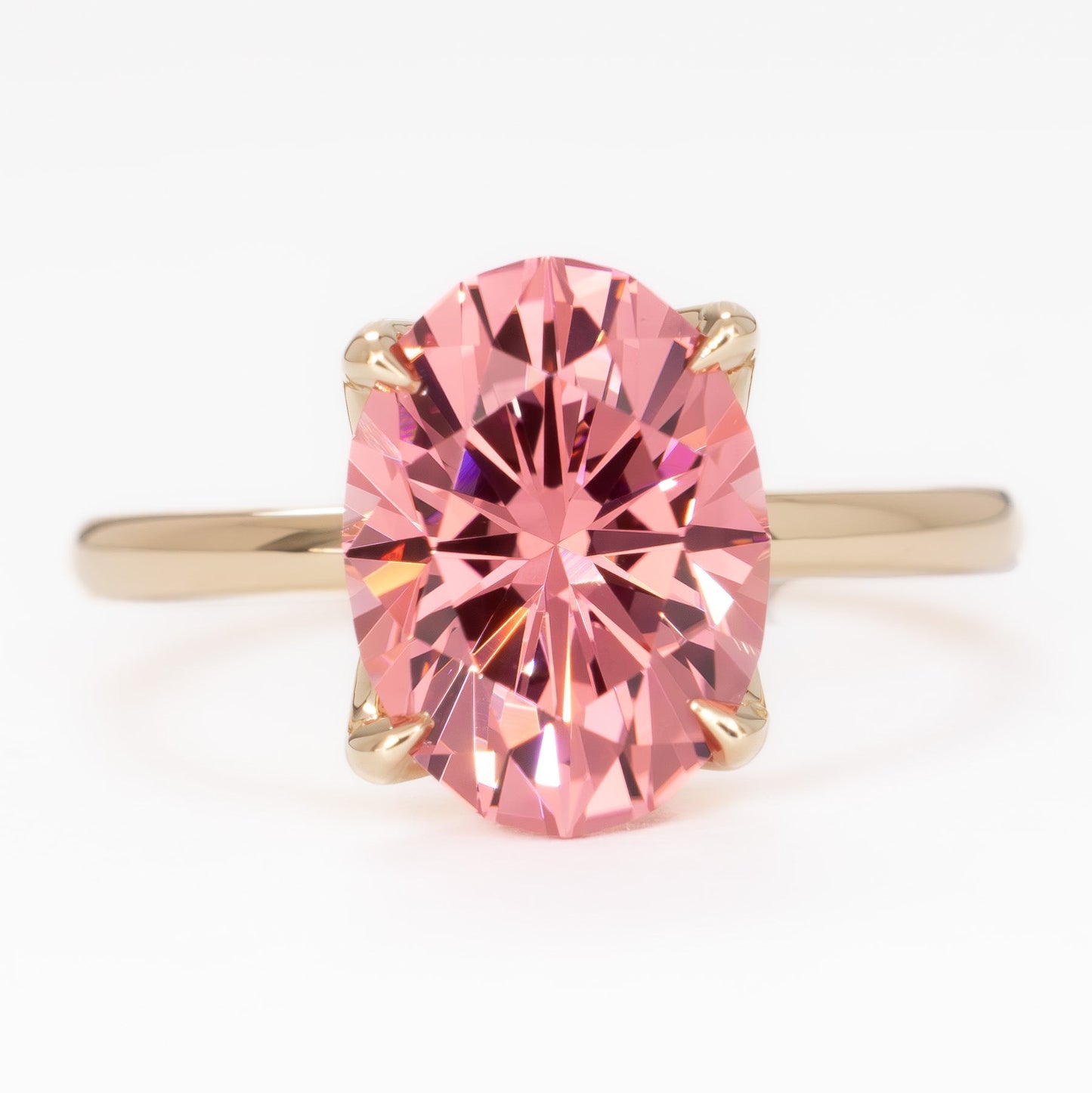 molly petal basket solitaire ring in yellow gold with oval pink lab sapphire