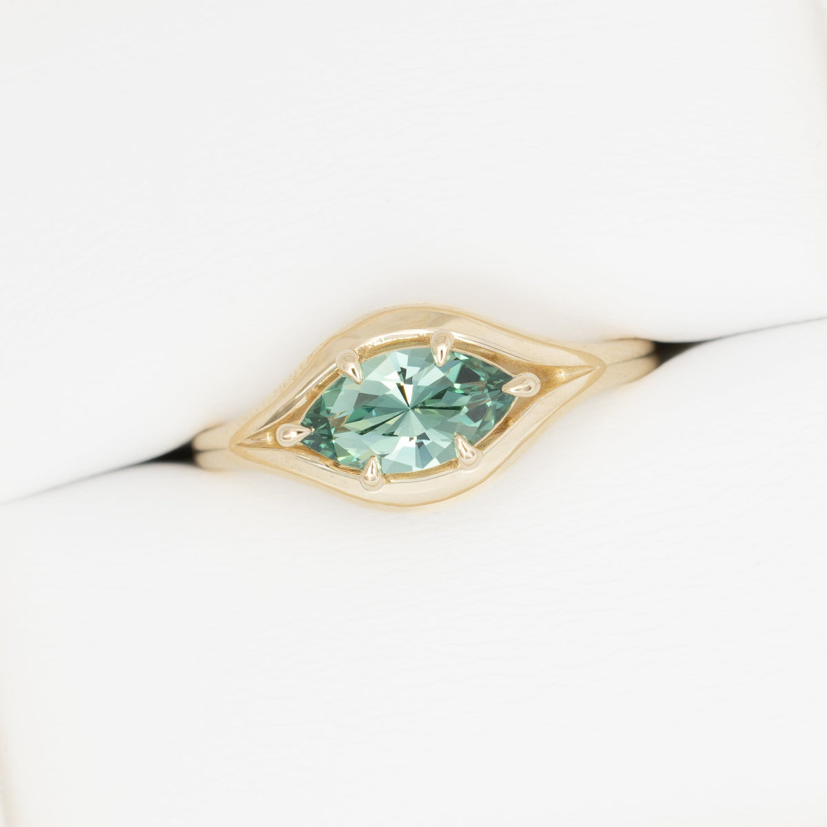 monica solitaire ring in yellow gold with juniper green lab sapphire baroness marquise