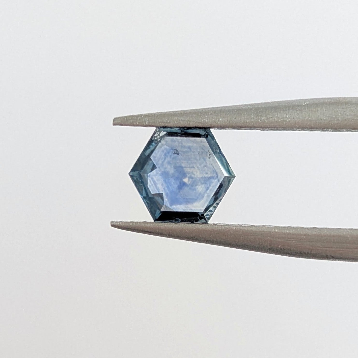 ms0244 0.65ct blue rose cut hex montana sapphire