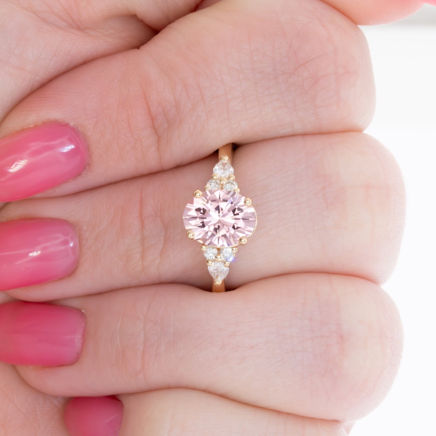 natalia engagement ring in yellow gold and pink oval lab sapphire