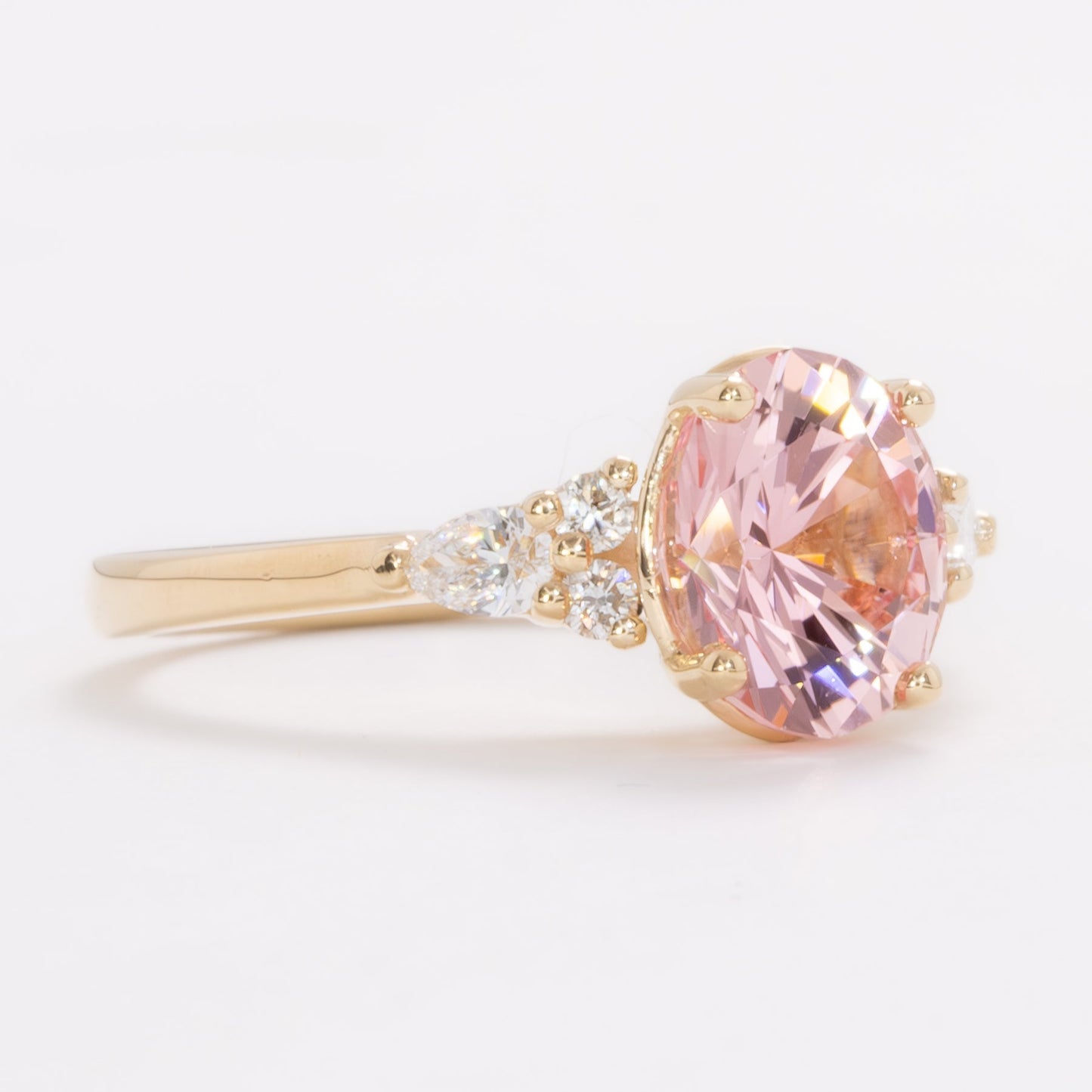 natalia engagement ring in yellow gold and pink oval lab sapphire