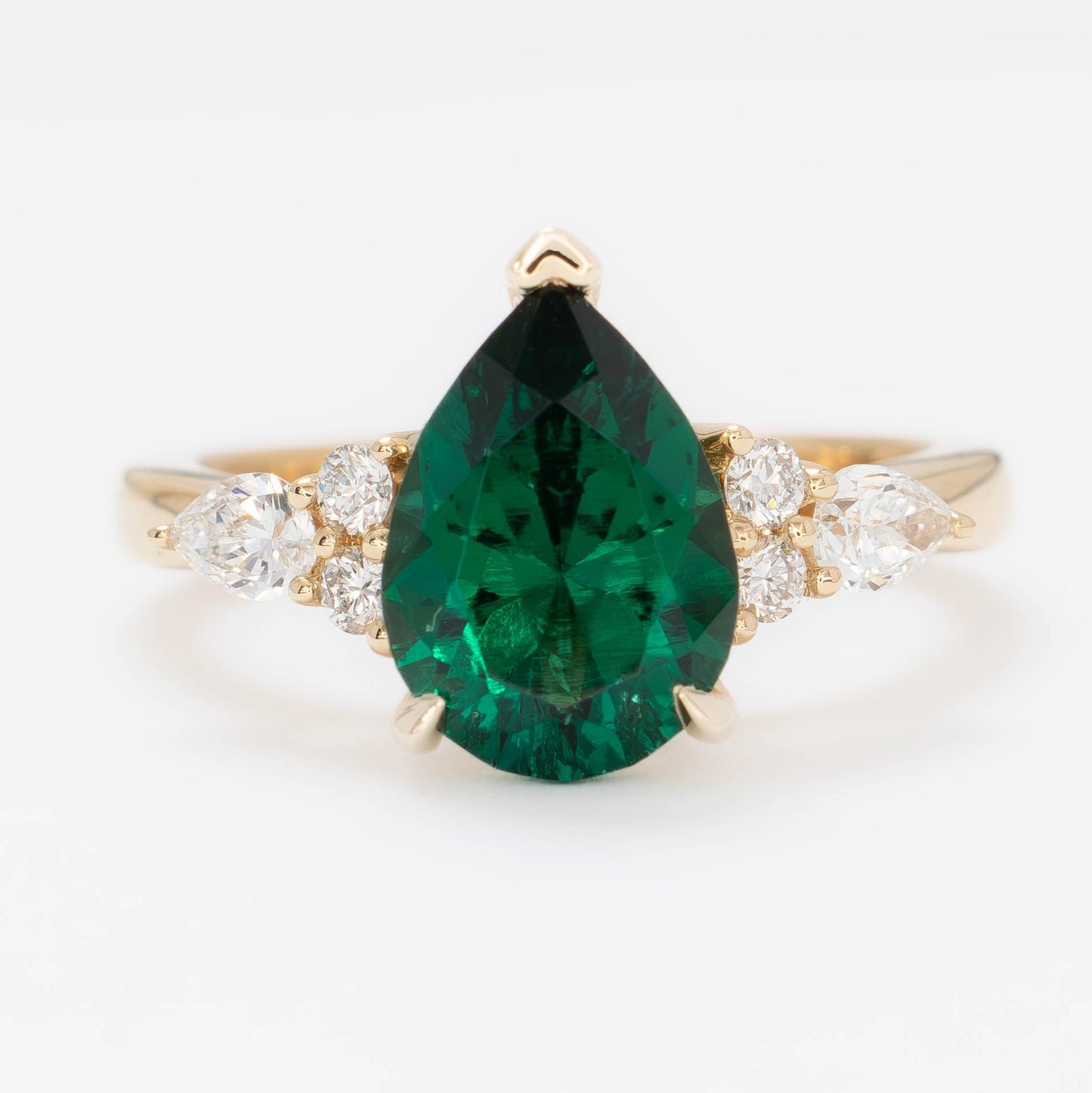 natalia wedding set in yellow gold with pear lab emerald