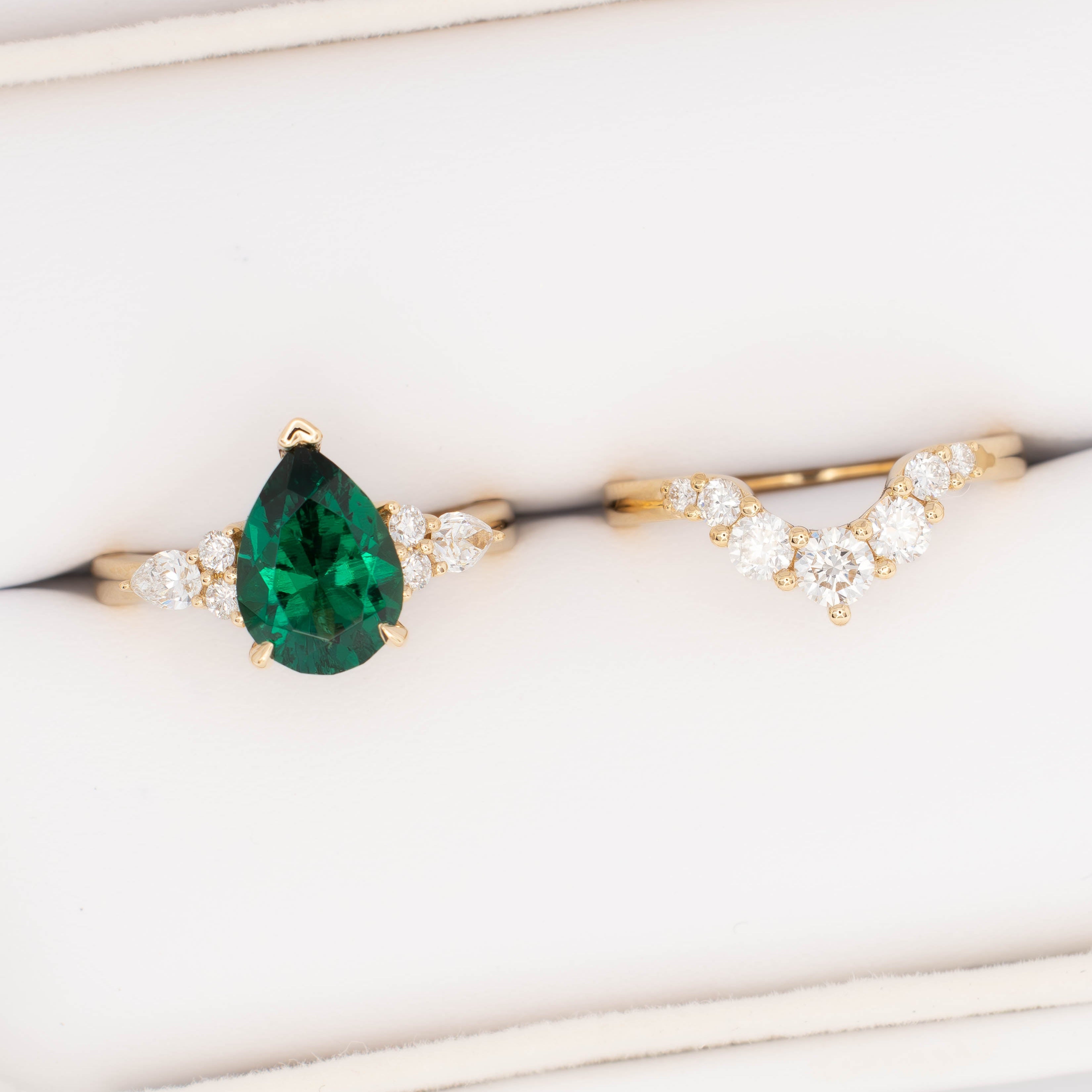 natalia wedding set in yellow gold with pear lab emerald
