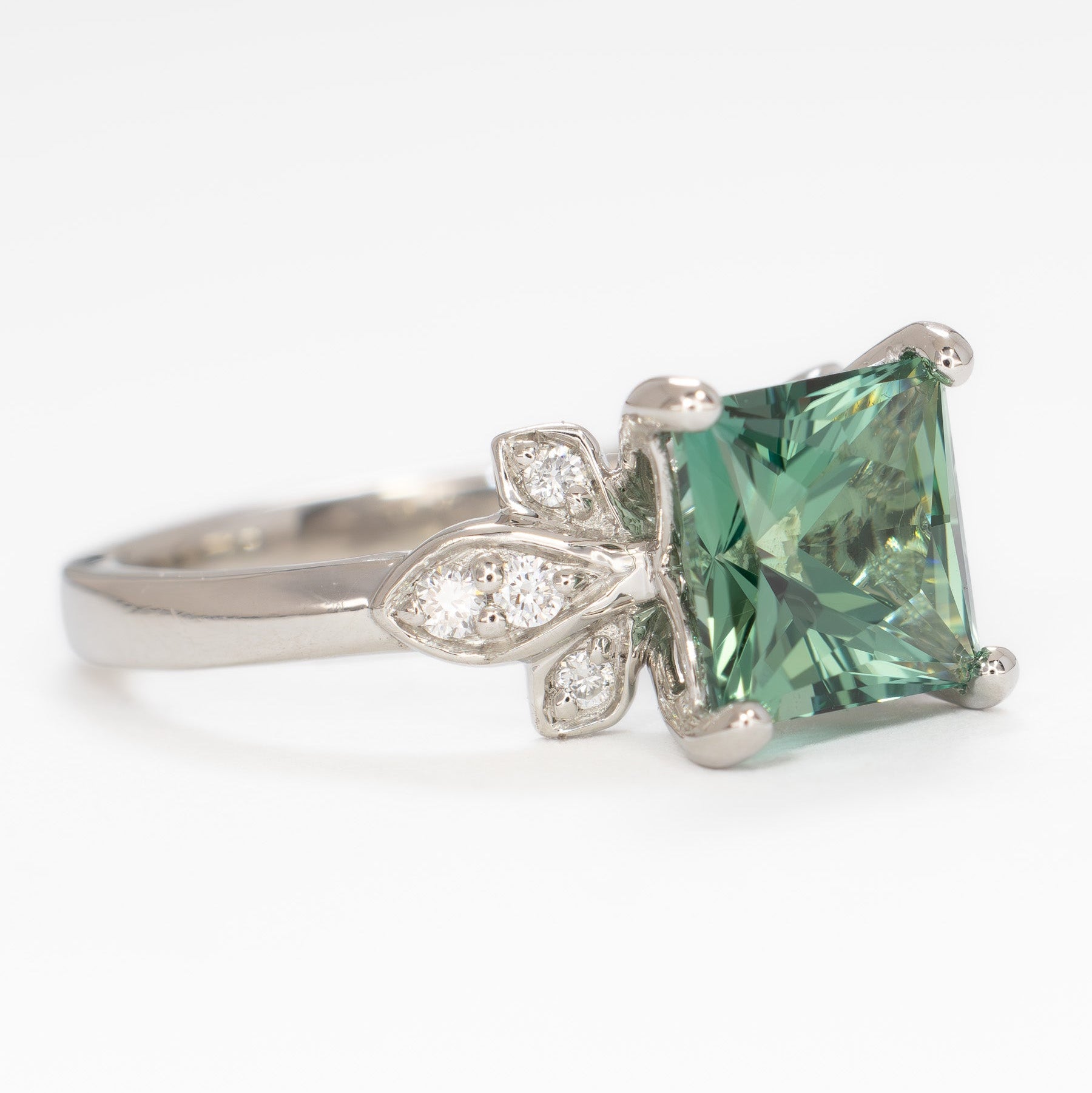 nature inspired azalea ring with green lab sapphire princess cut