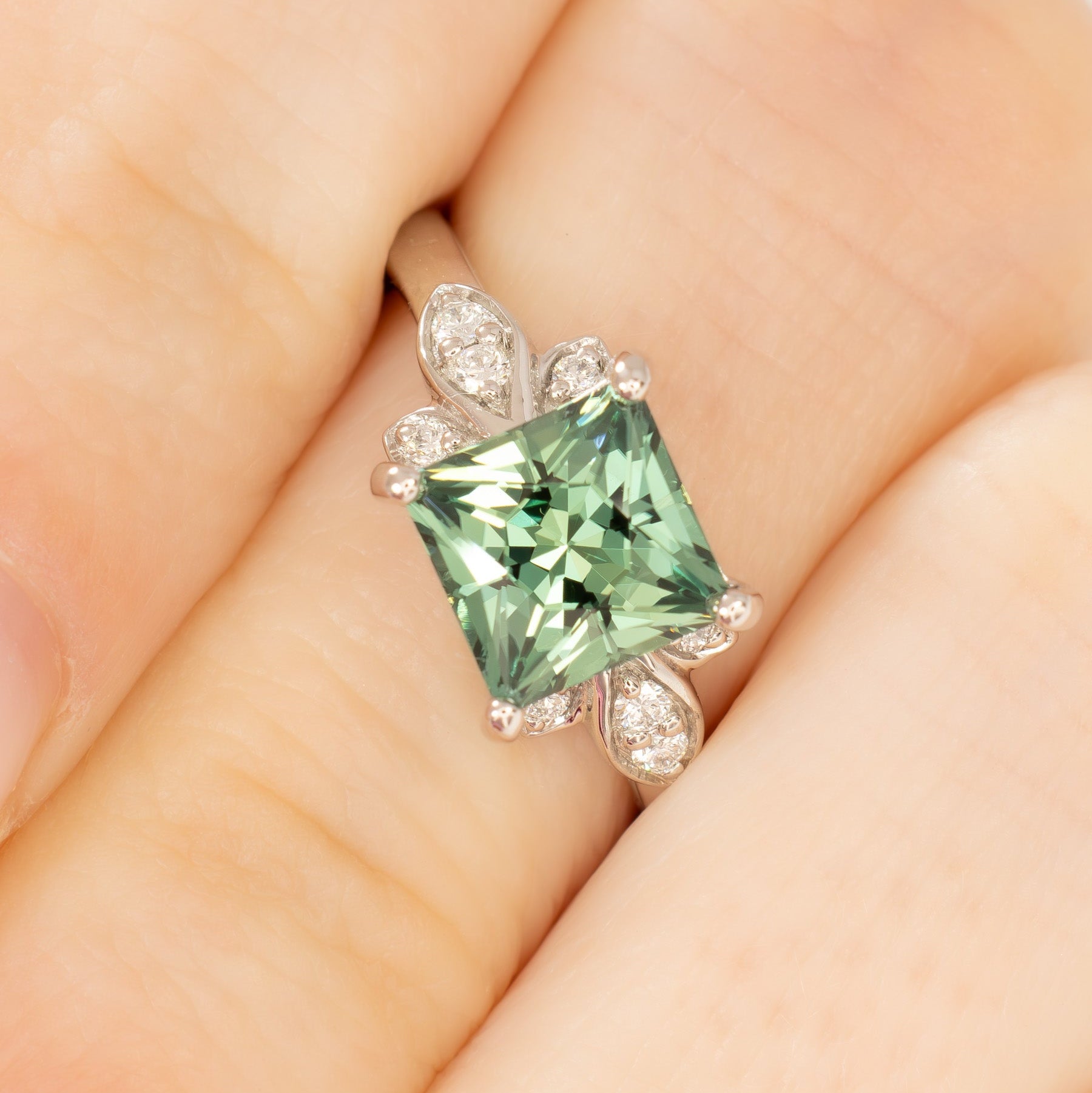 nature inspired azalea ring with green lab sapphire princess cut
