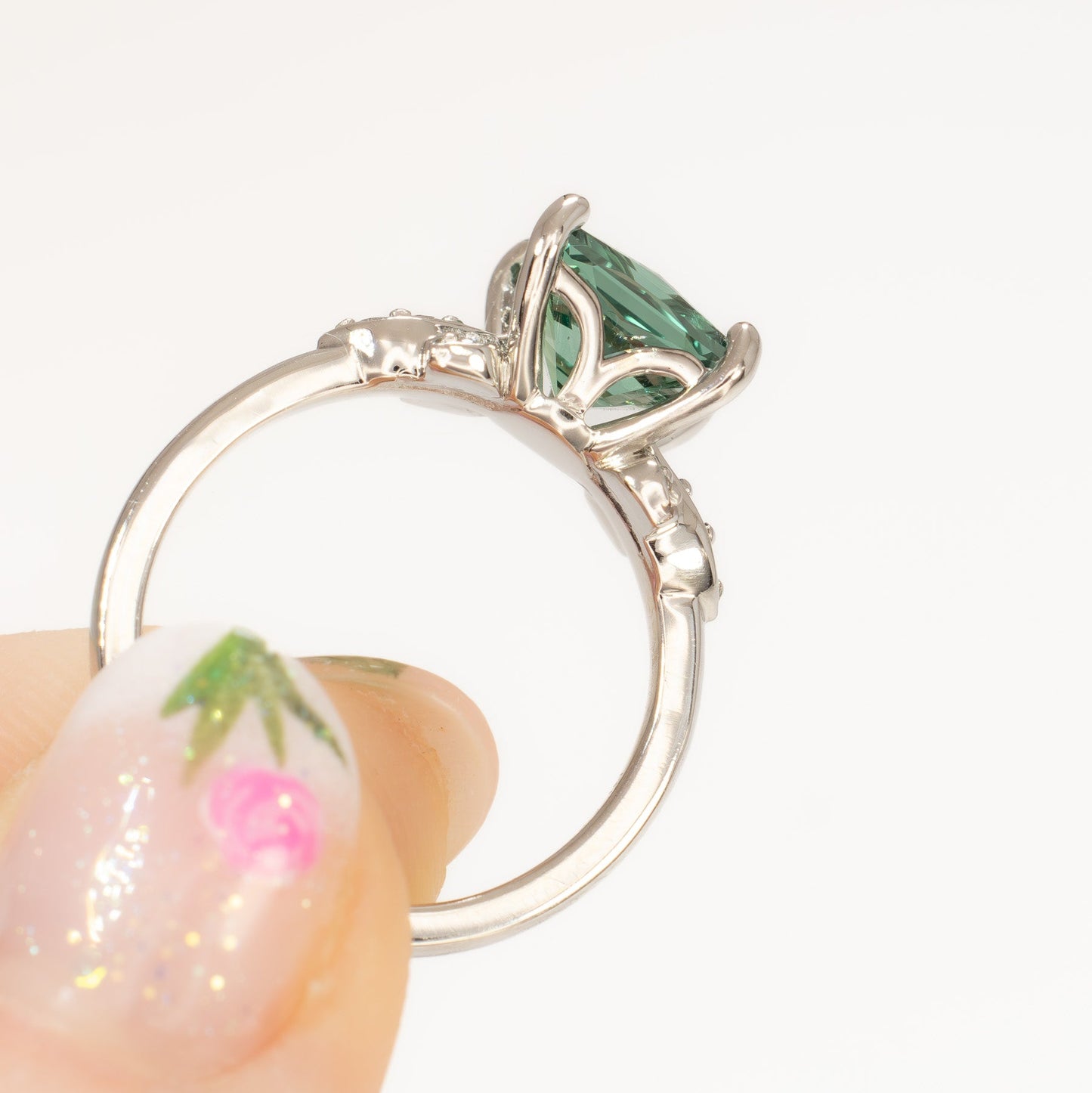 nature inspired azalea ring with green lab sapphire princess cut