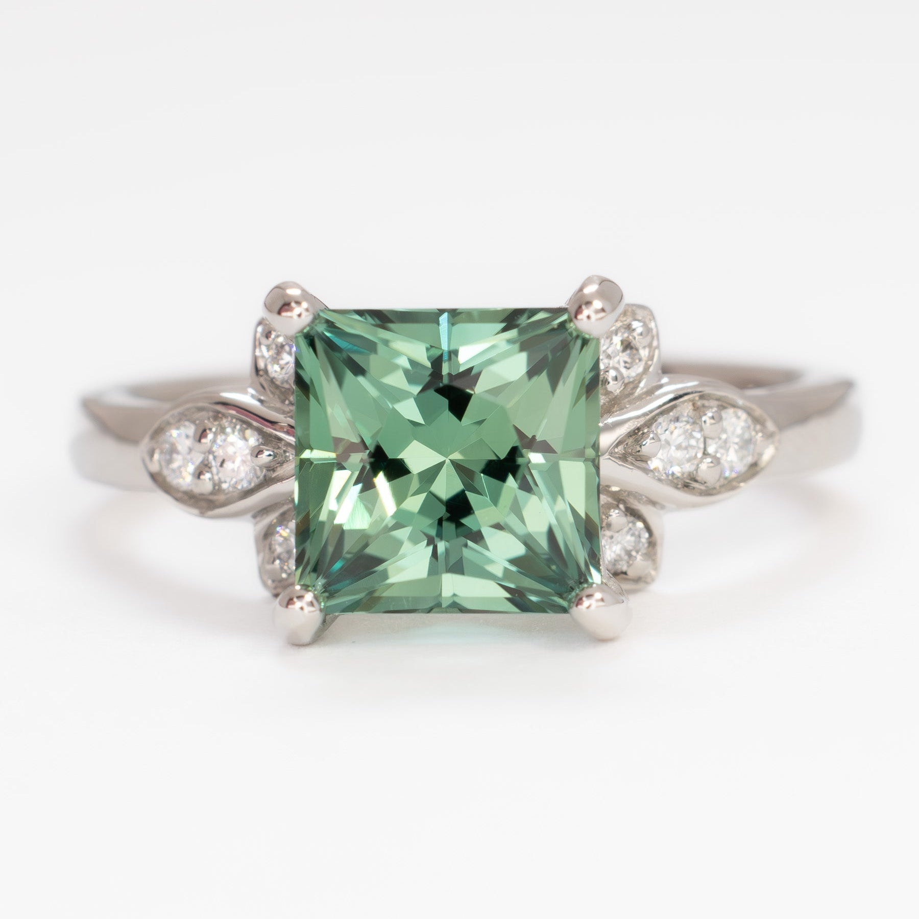 nature inspired azalea ring with green lab sapphire princess cut