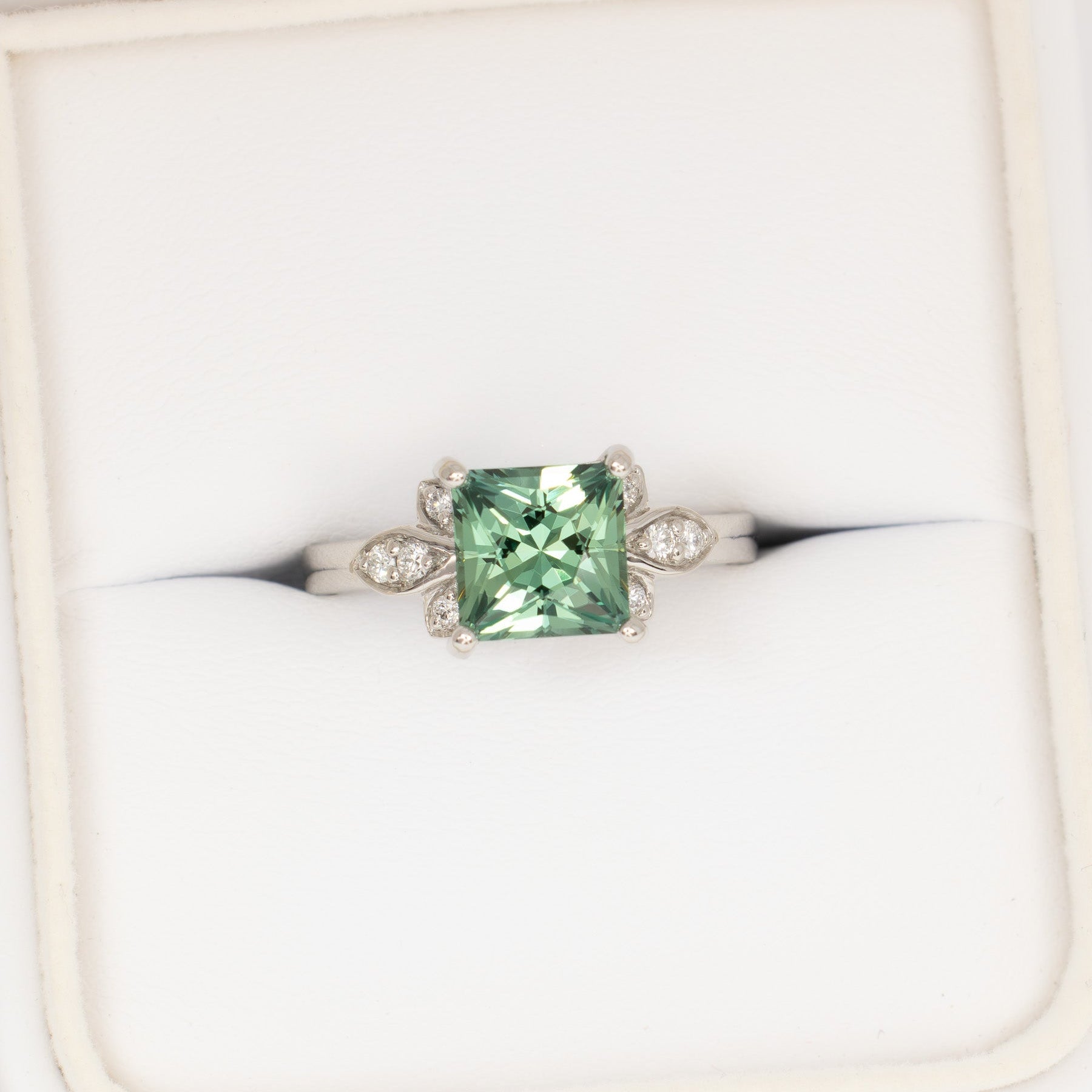 nature inspired azalea ring with green lab sapphire princess cut